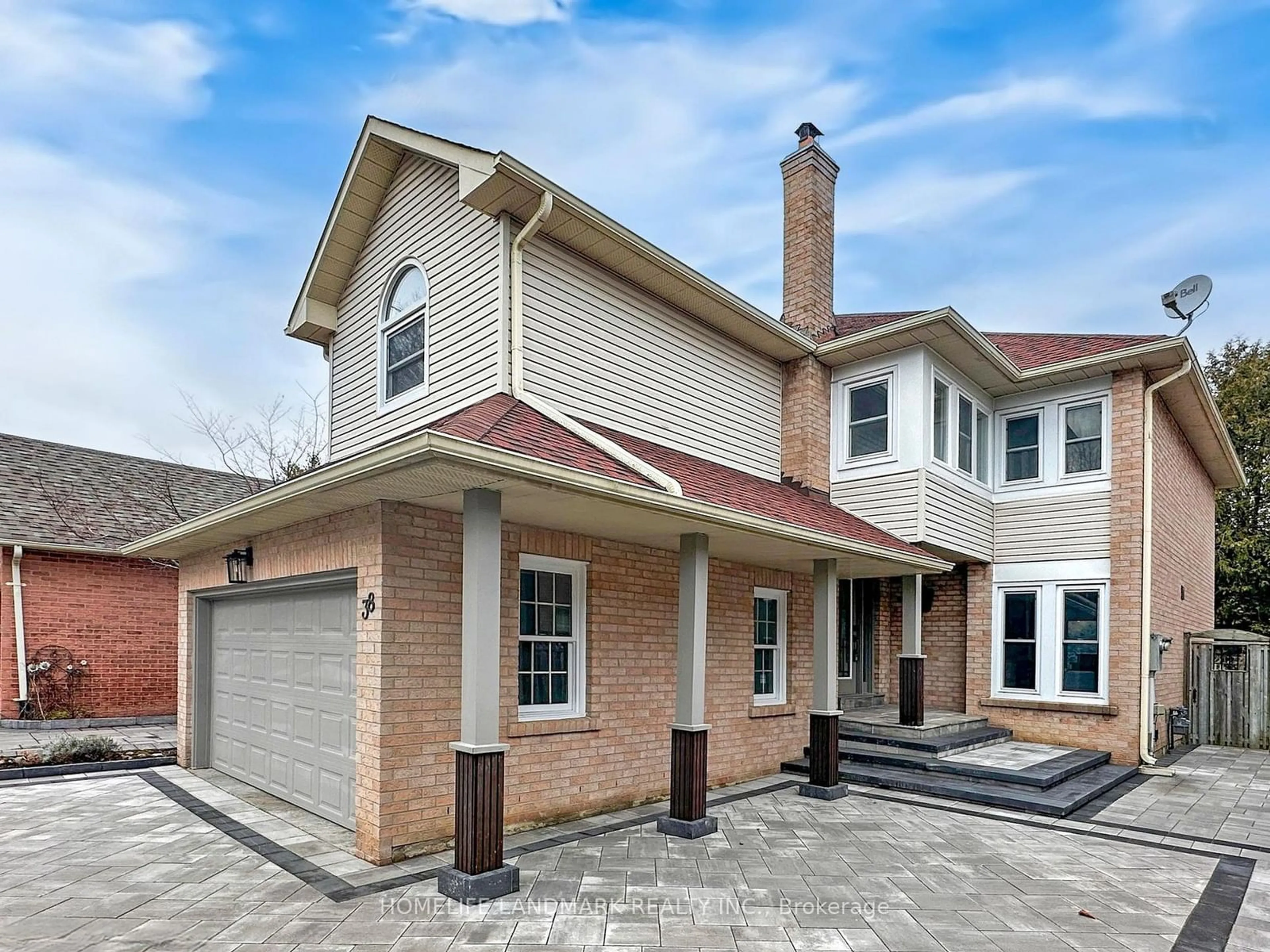 Home with brick exterior material, street for 38 Juniper Cres, Markham Ontario L3R 3Z7