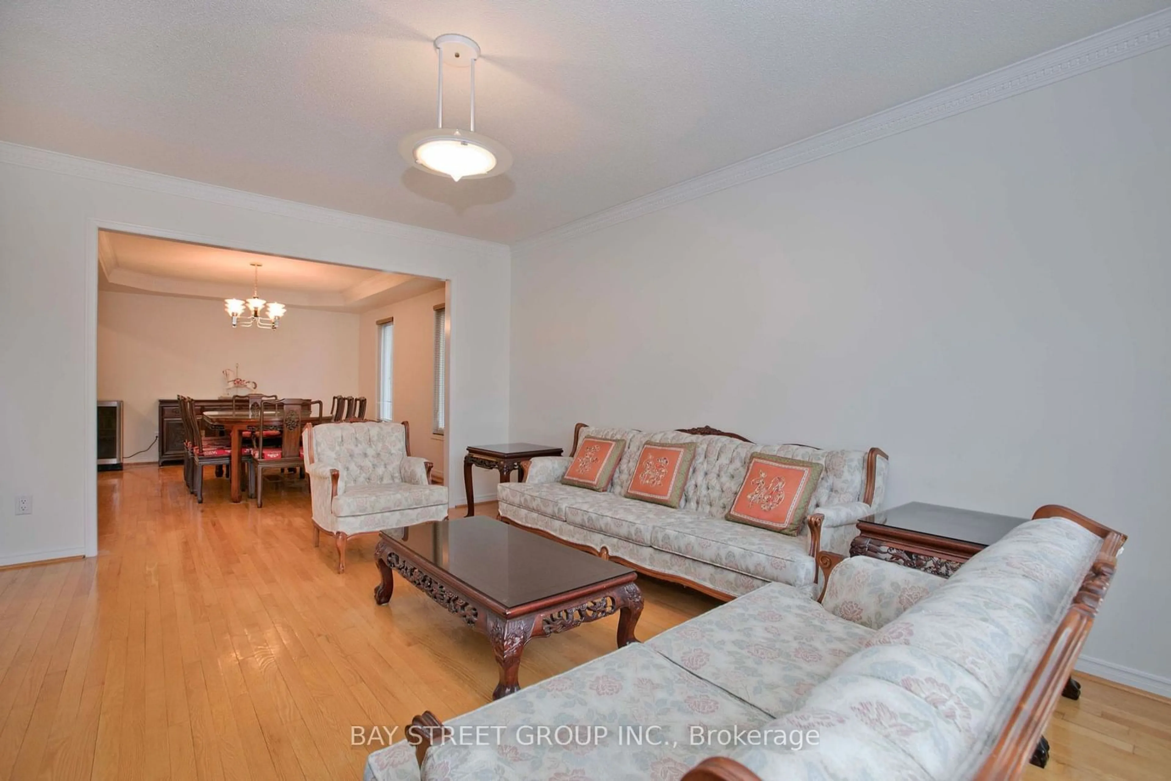 Living room with furniture, wood/laminate floor for 29 Webber Cres, Markham Ontario L3R 2L3