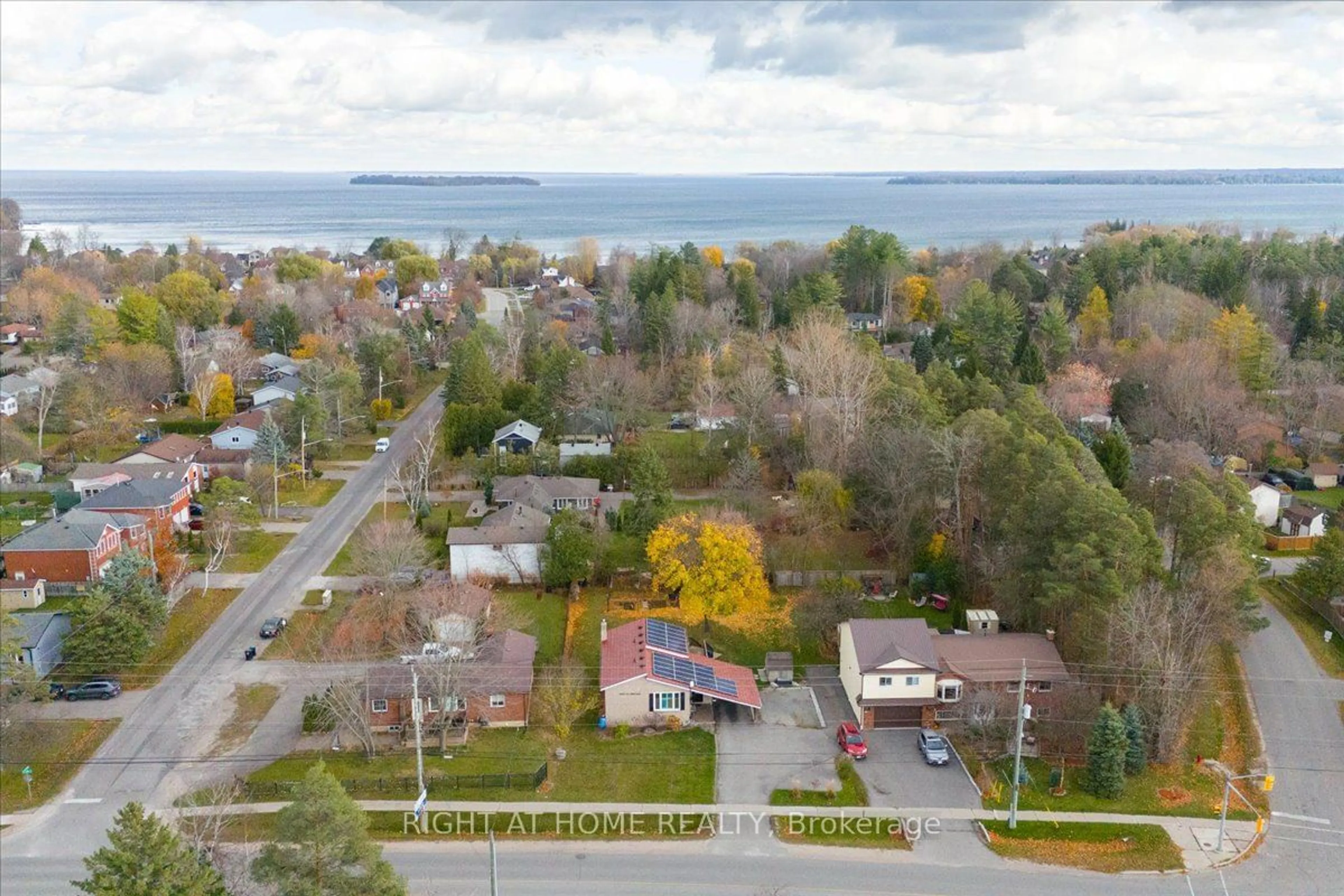 A pic from outside/outdoor area/front of a property/back of a property/a pic from drone, water/lake/river/ocean view for 2263 25th Sdrd, Innisfil Ontario L9S 2E5