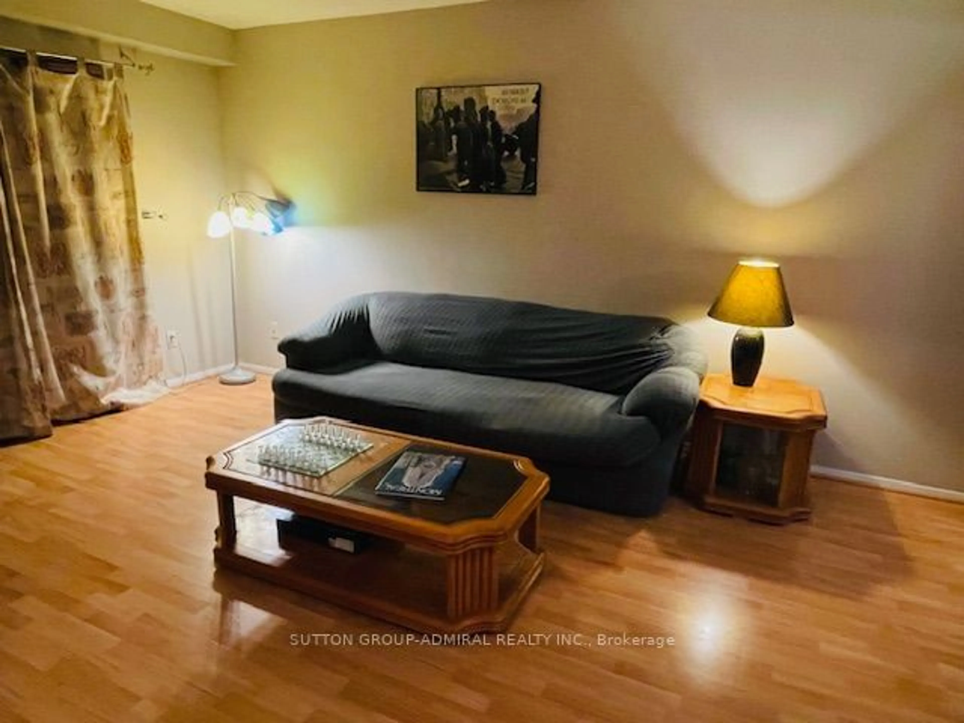 Living room with furniture, wood/laminate floor for 46 Morley Rd, Vaughan Ontario L4J 2N5