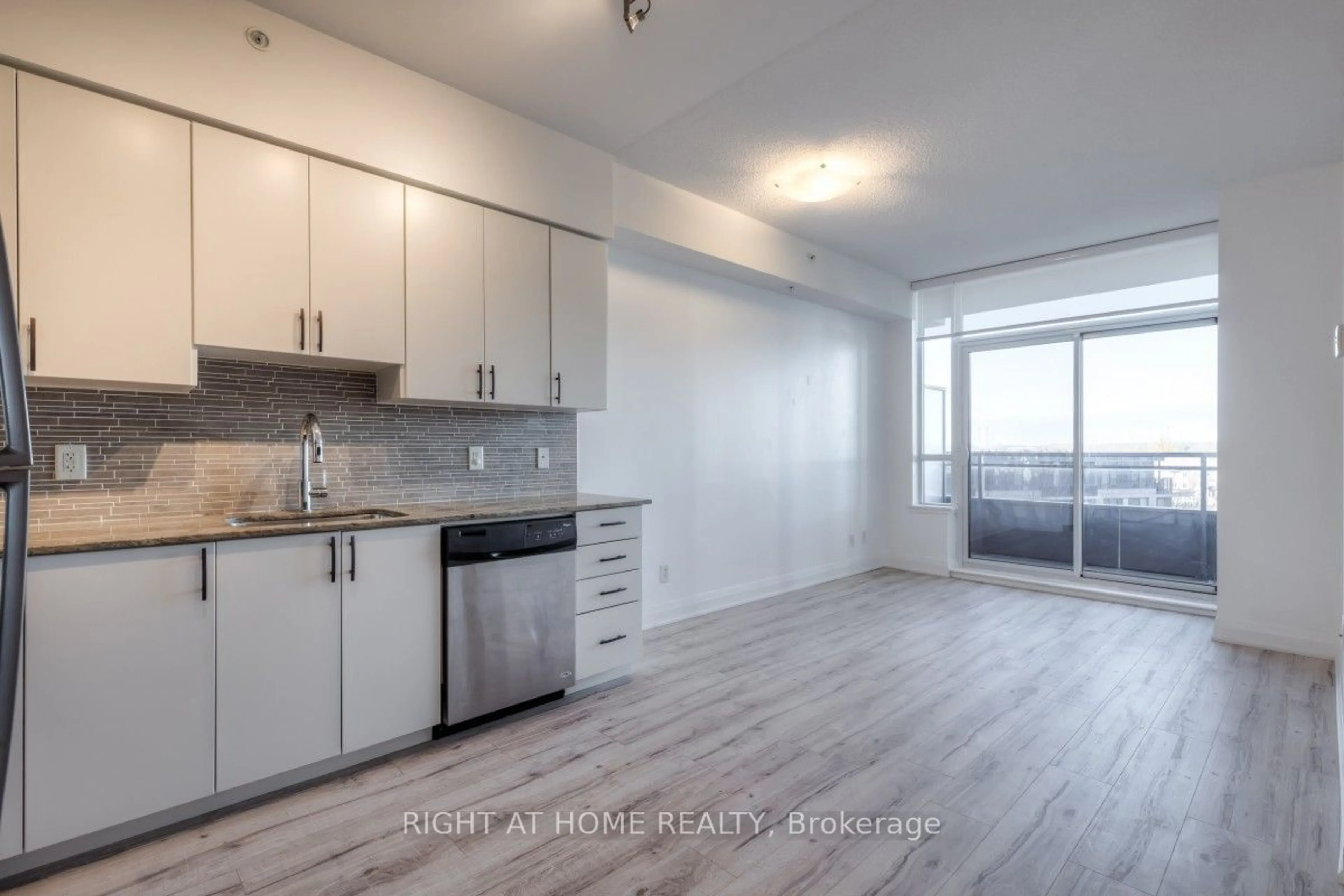 Open concept kitchen, wood/laminate floor for 85 North Park Rd #502, Vaughan Ontario L4J 0H9