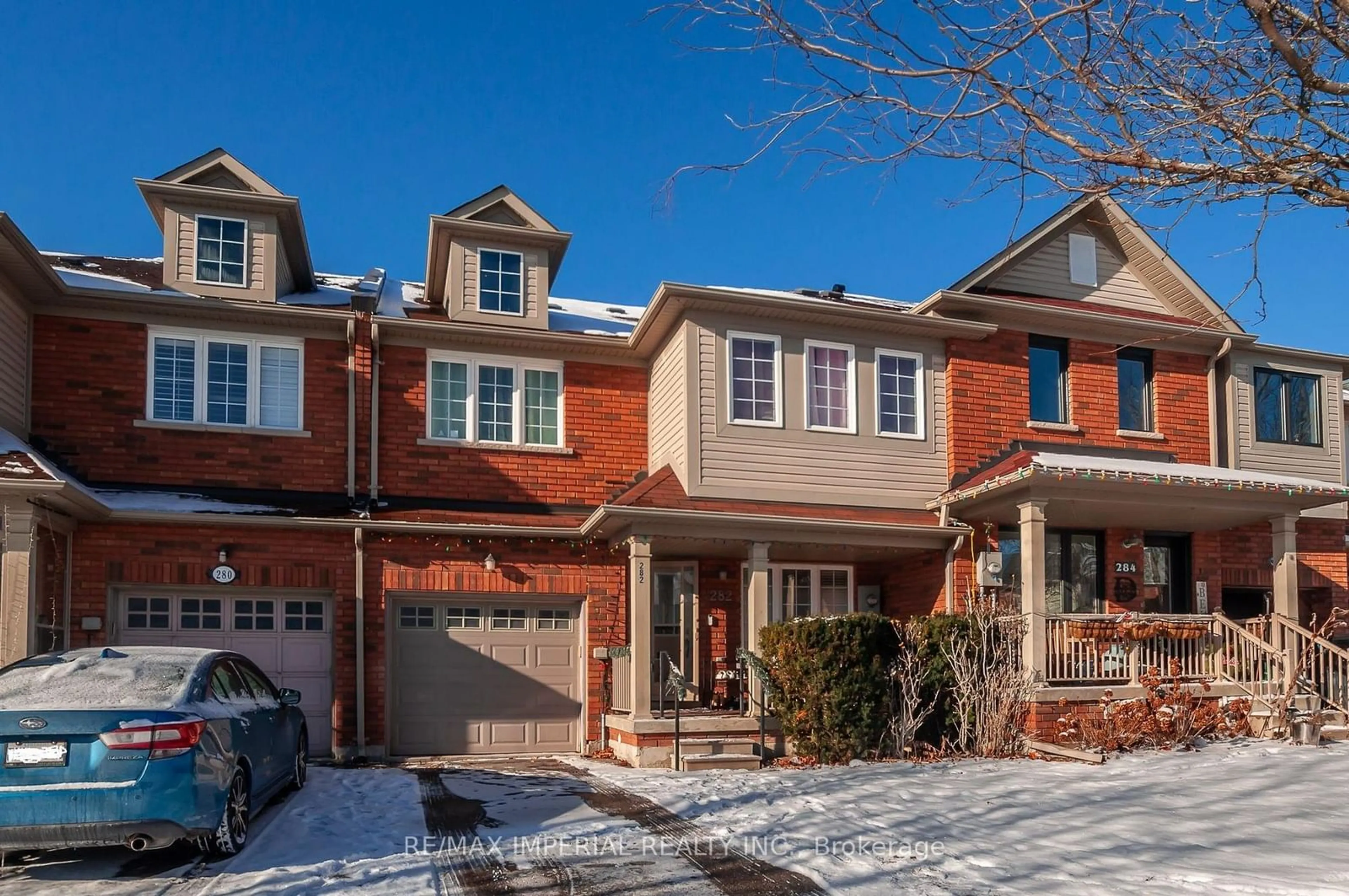 Home with brick exterior material, street for 282 Coachwhip Tr, Newmarket Ontario L3X 2Y4