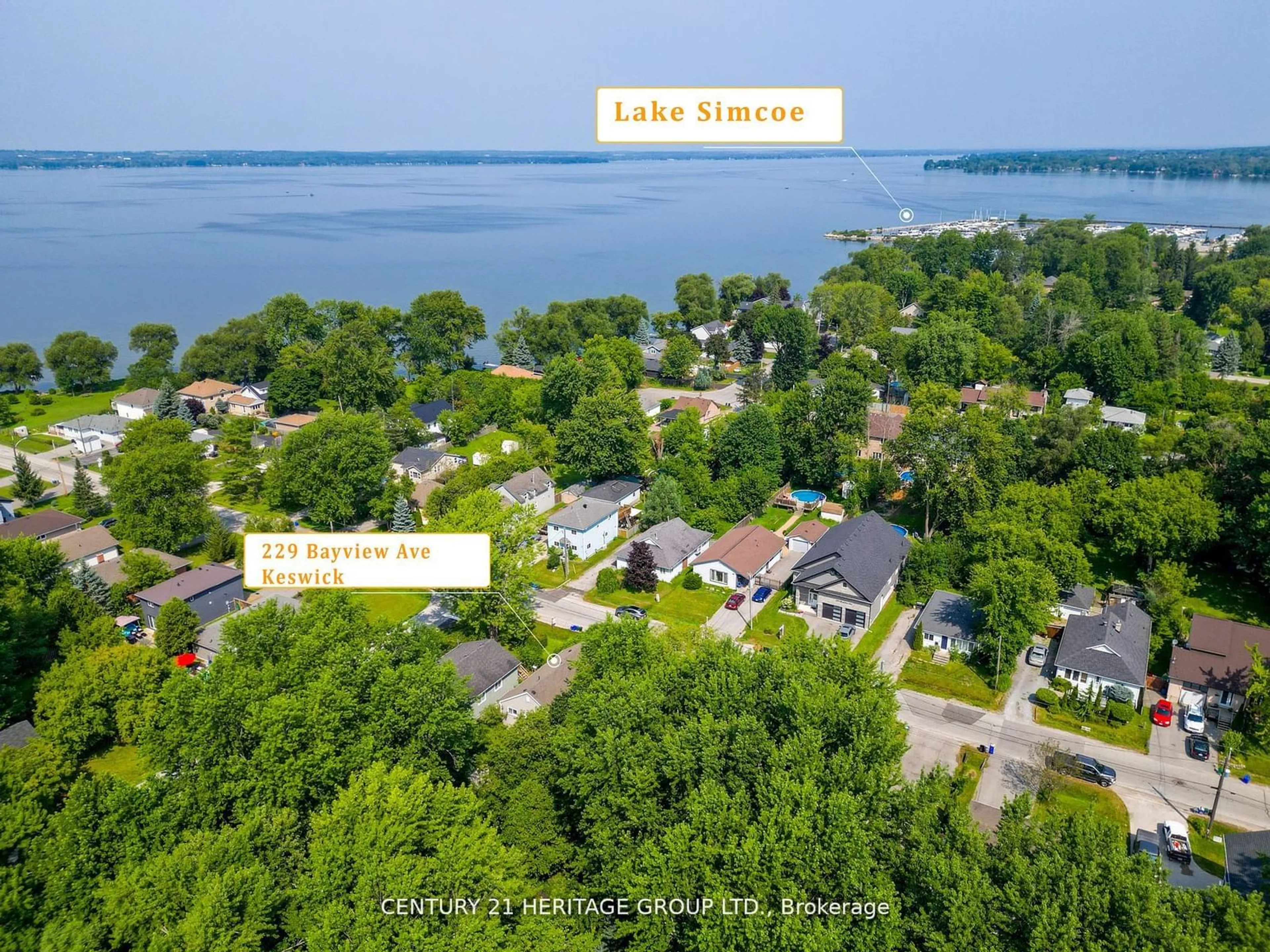 A pic from outside/outdoor area/front of a property/back of a property/a pic from drone, water/lake/river/ocean view for 229 Bayview Ave, Georgina Ontario L4P 2T3