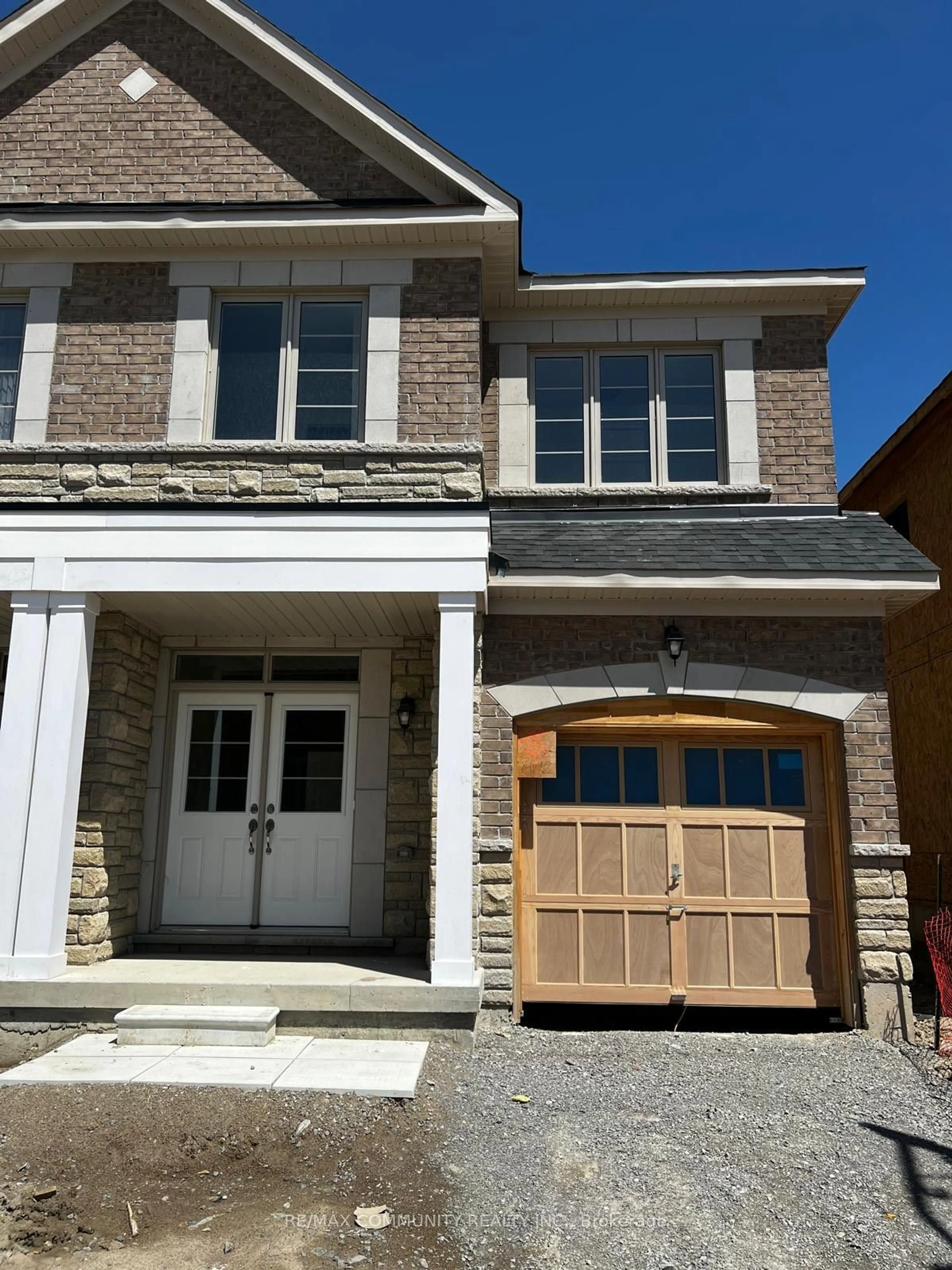 Home with brick exterior material, street for 12 Finley Way, Markham Ontario L3S 0E8