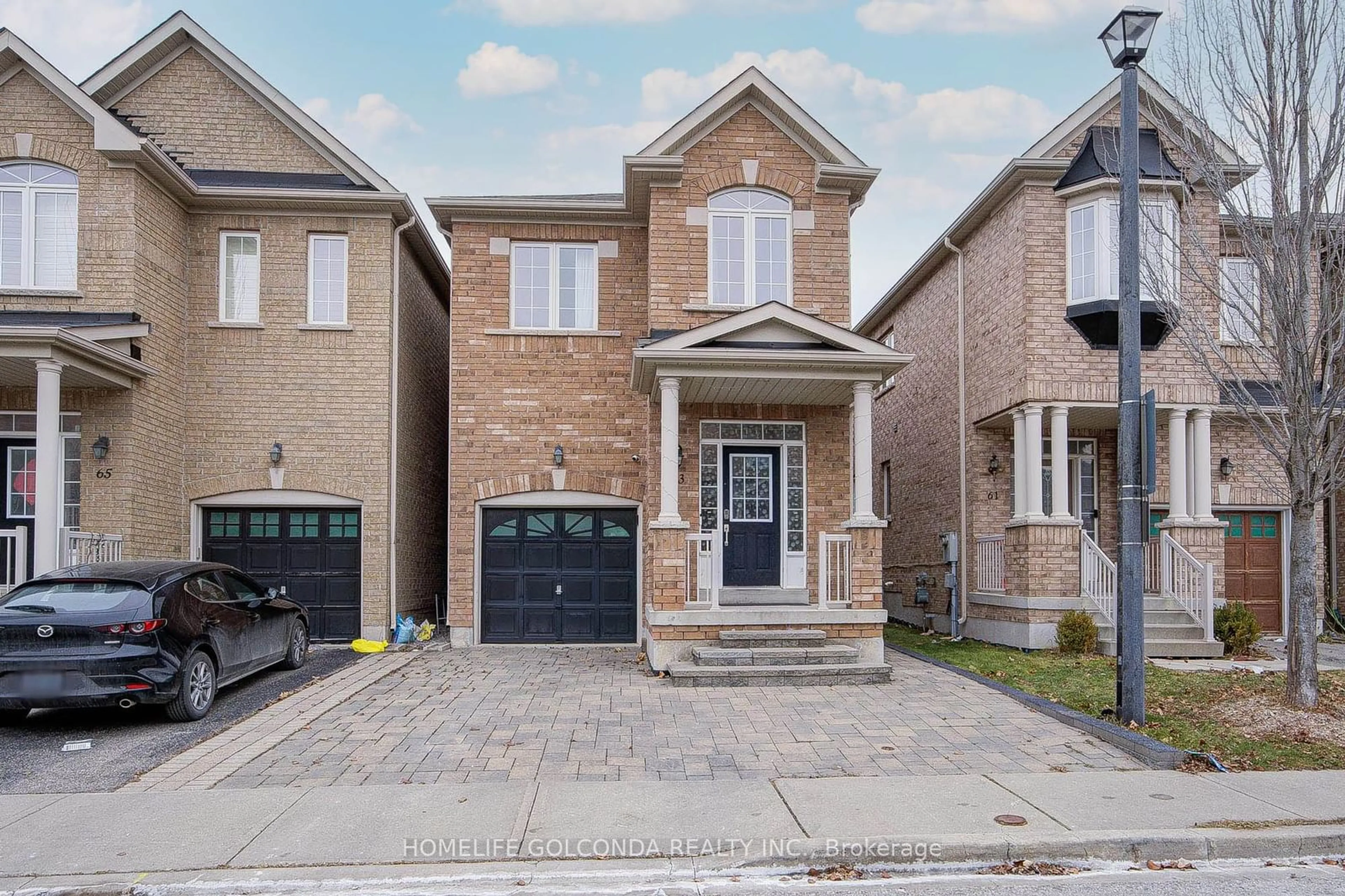 Home with brick exterior material, street for 63 Kincaid Lane, Markham Ontario L3S 0B9