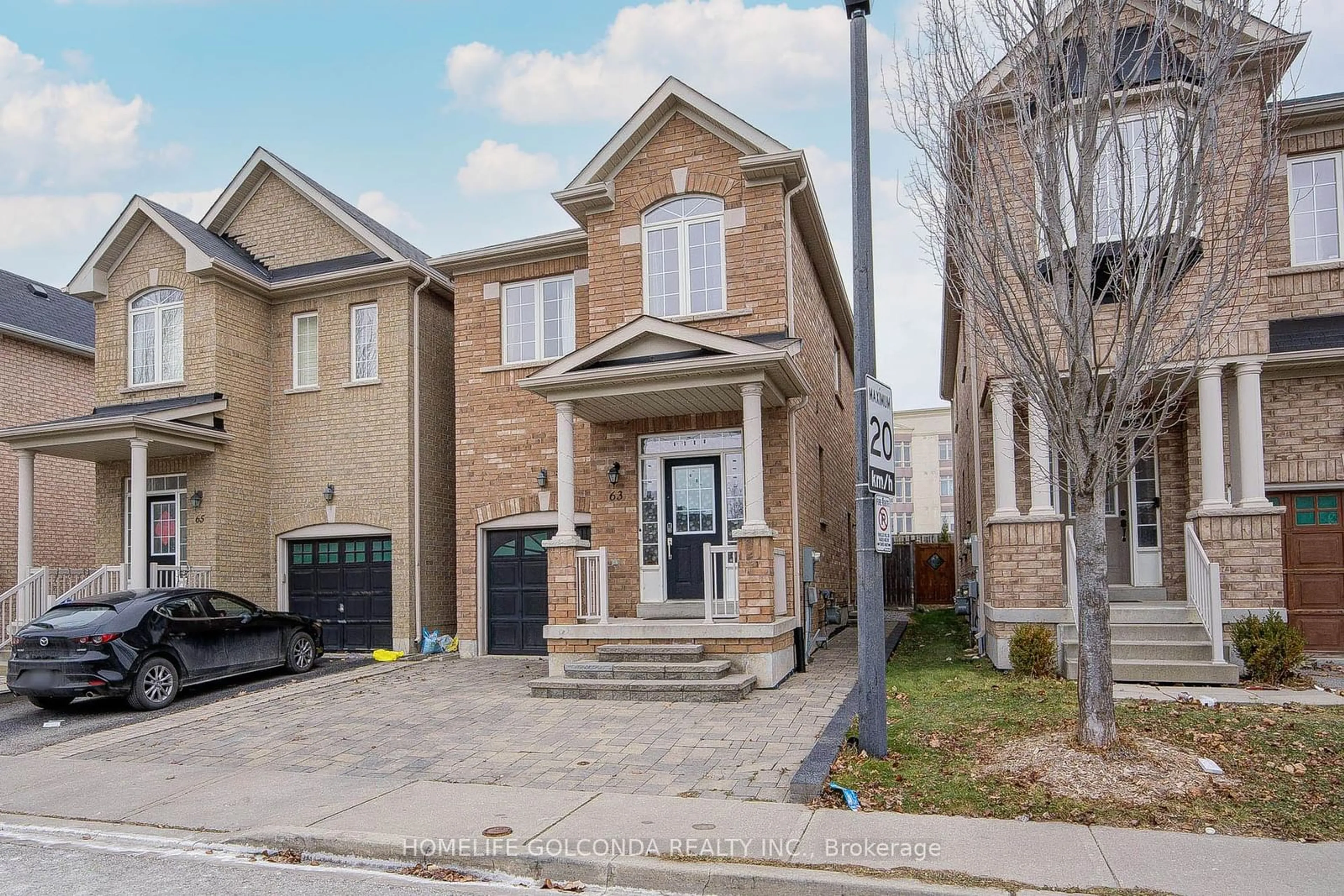 Home with brick exterior material, street for 63 Kincaid Lane, Markham Ontario L3S 0B9