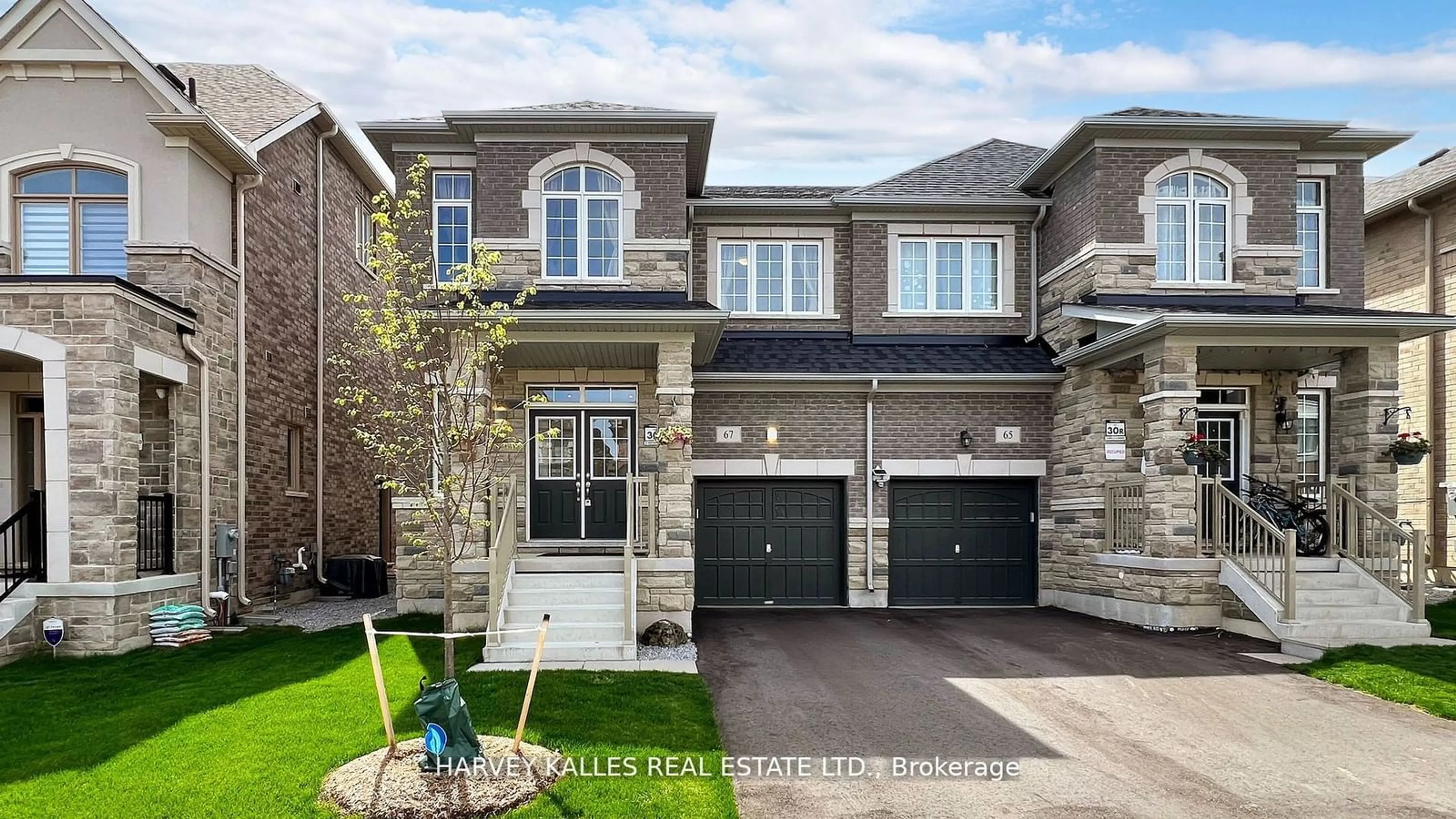 Home with brick exterior material, street for 67 Crofting Cres, Markham Ontario L6E 0W1