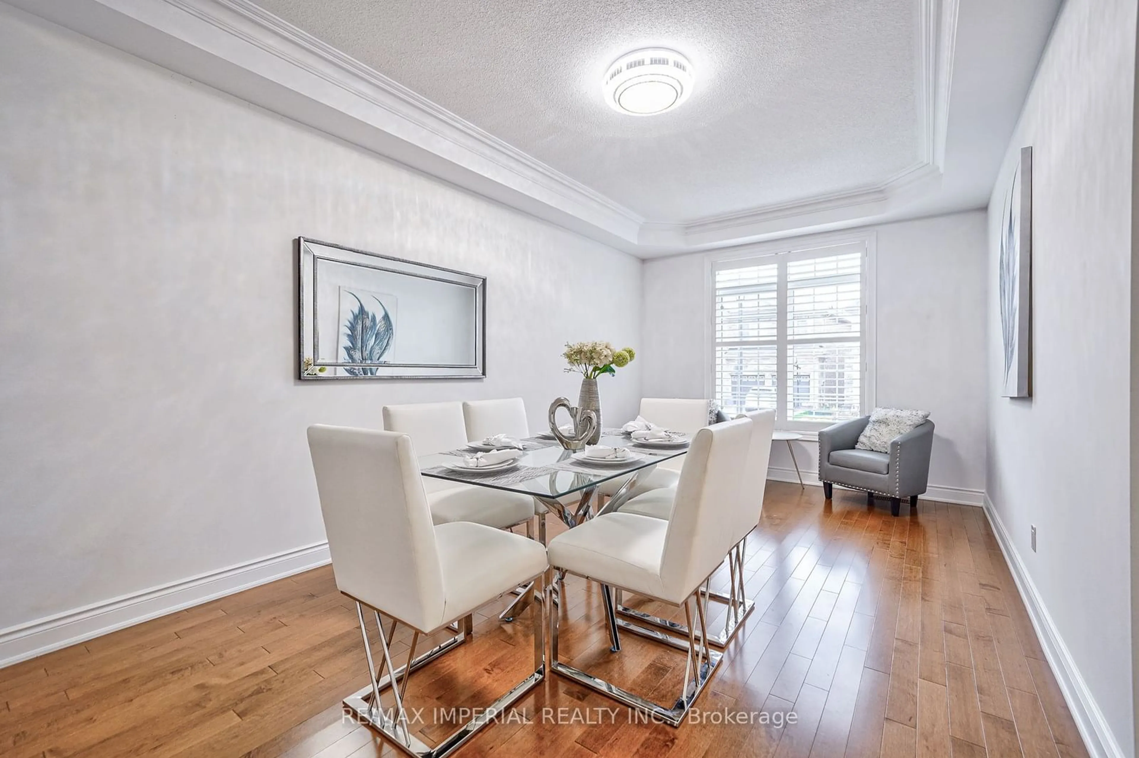 Dining room, wood/laminate floor for 1054 Bob Scott Crt, Newmarket Ontario L3X 3L7