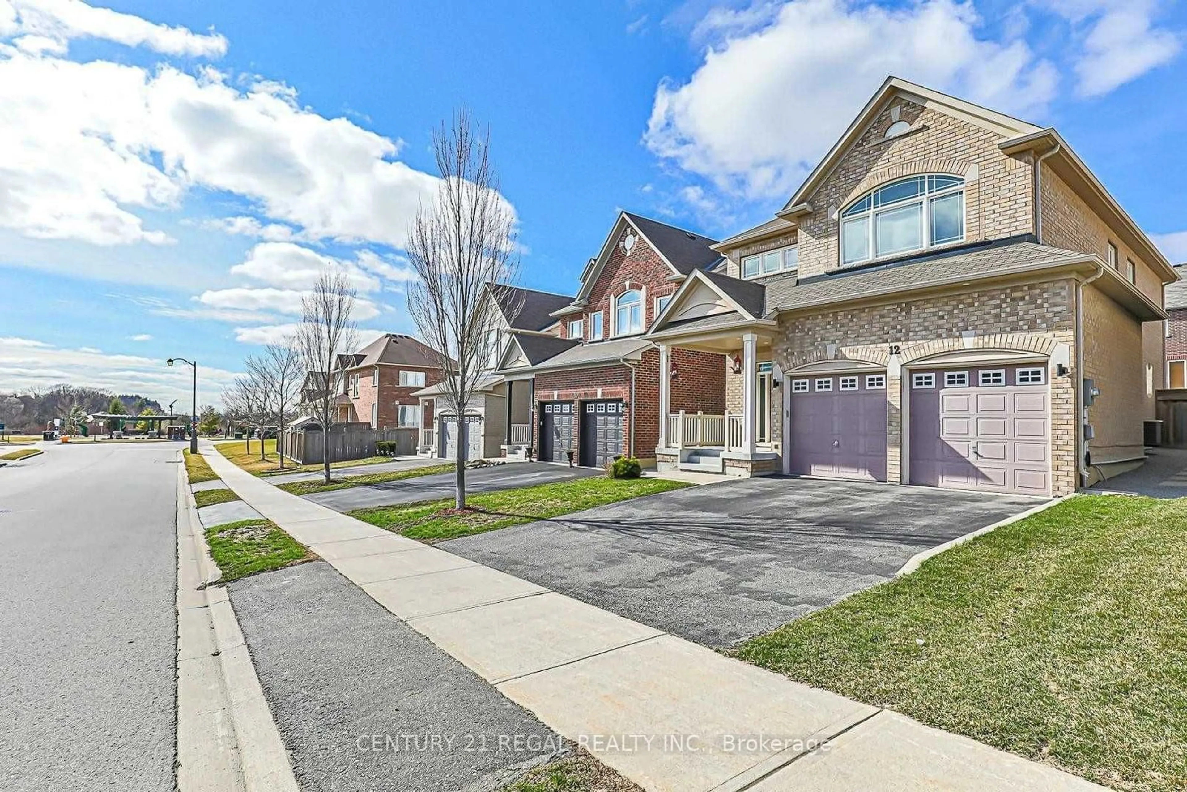 Home with brick exterior material, street for 12 Harvest Hills Blvd, East Gwillimbury Ontario L9N 0A5