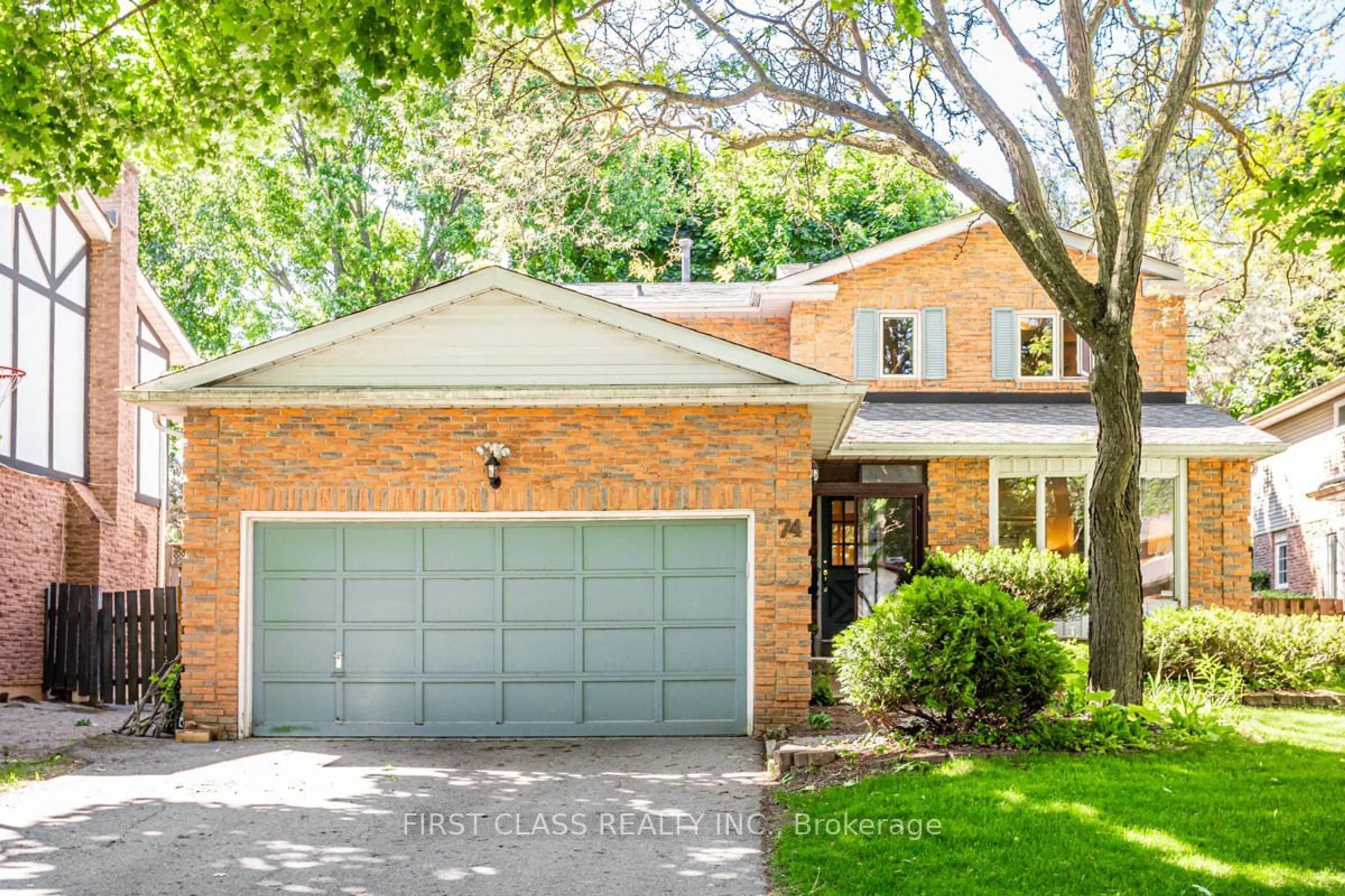 Home with brick exterior material, street for 74 Innisbrook Cres, Markham Ontario L3T 5B1