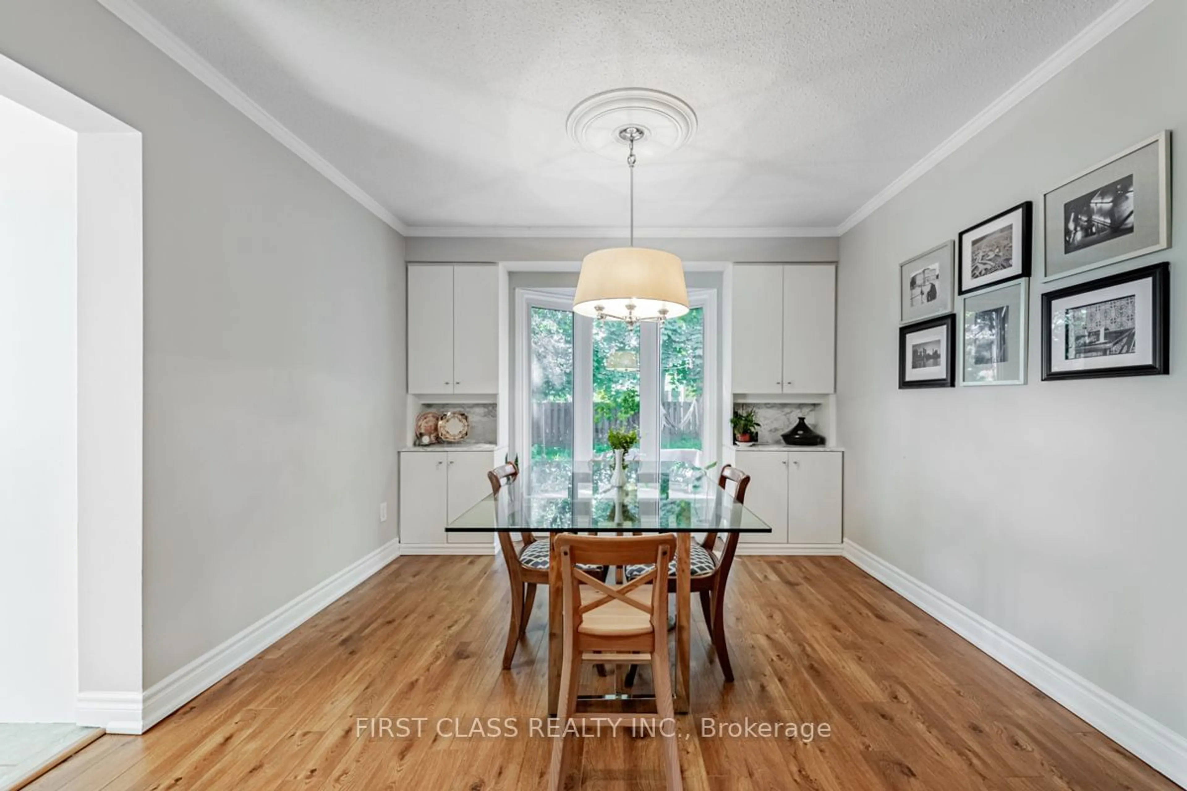 Dining room, wood/laminate floor for 74 Innisbrook Cres, Markham Ontario L3T 5B1