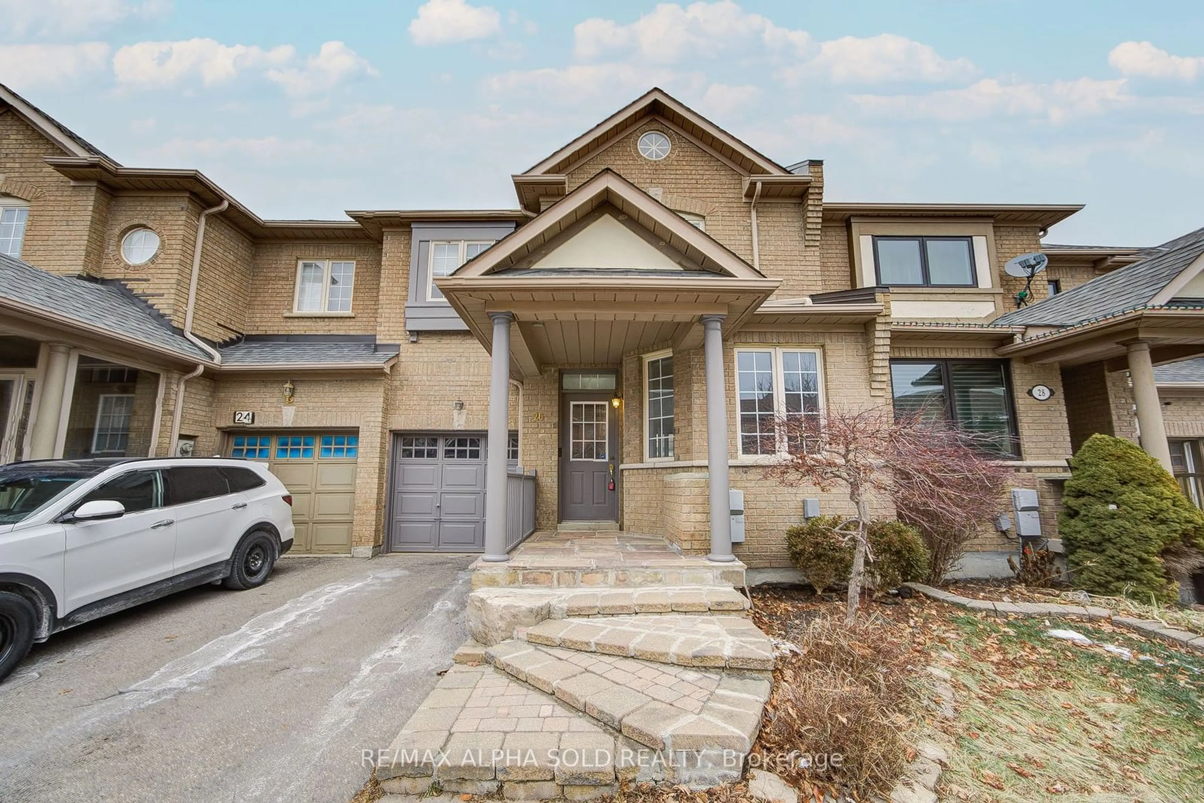 Home with brick exterior material, street for 26 Whitford Rd, Markham Ontario L6C 2J2