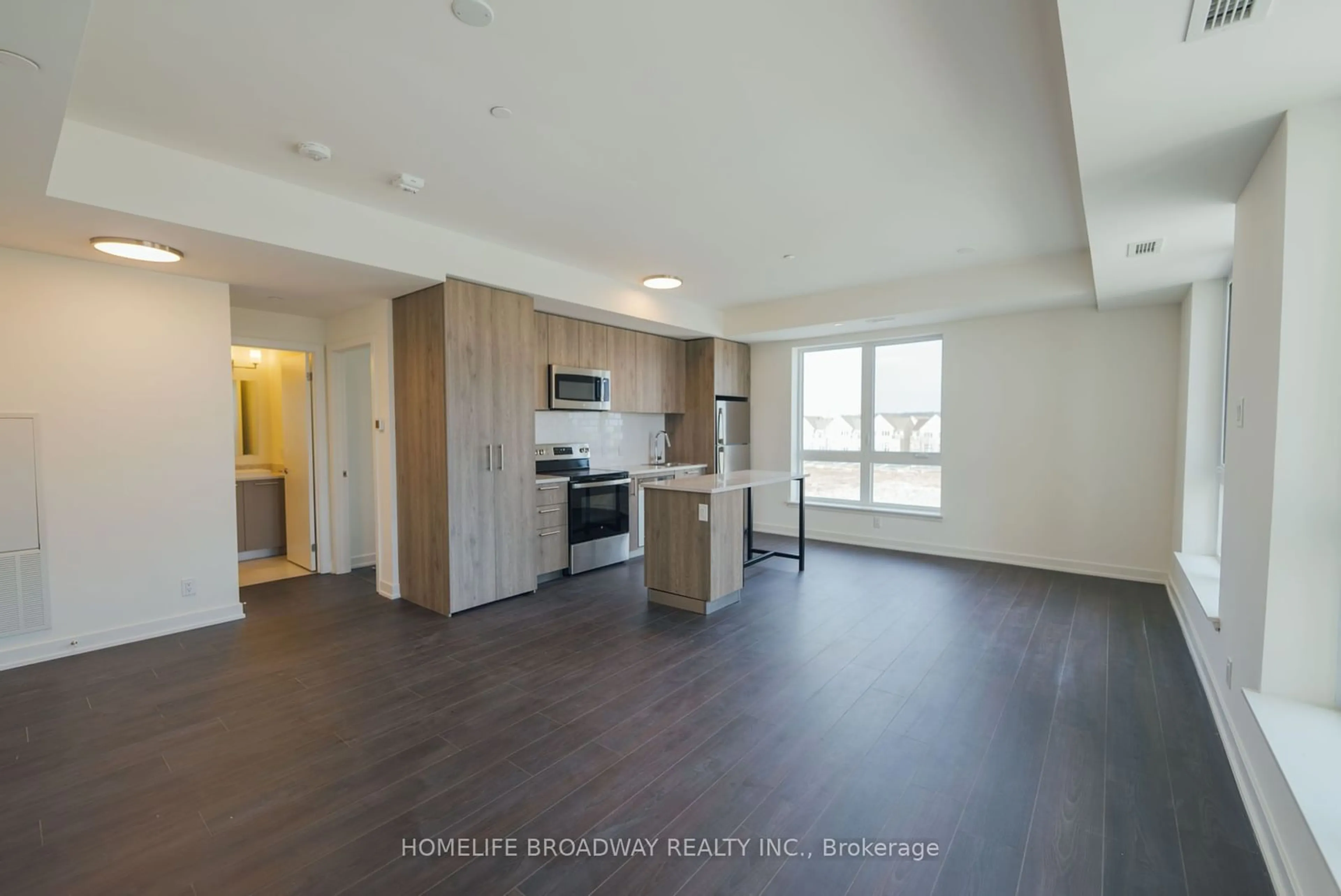 Open concept kitchen, wood/laminate floor for 101 Cathedral High St #345, Markham Ontario L6C 3L8