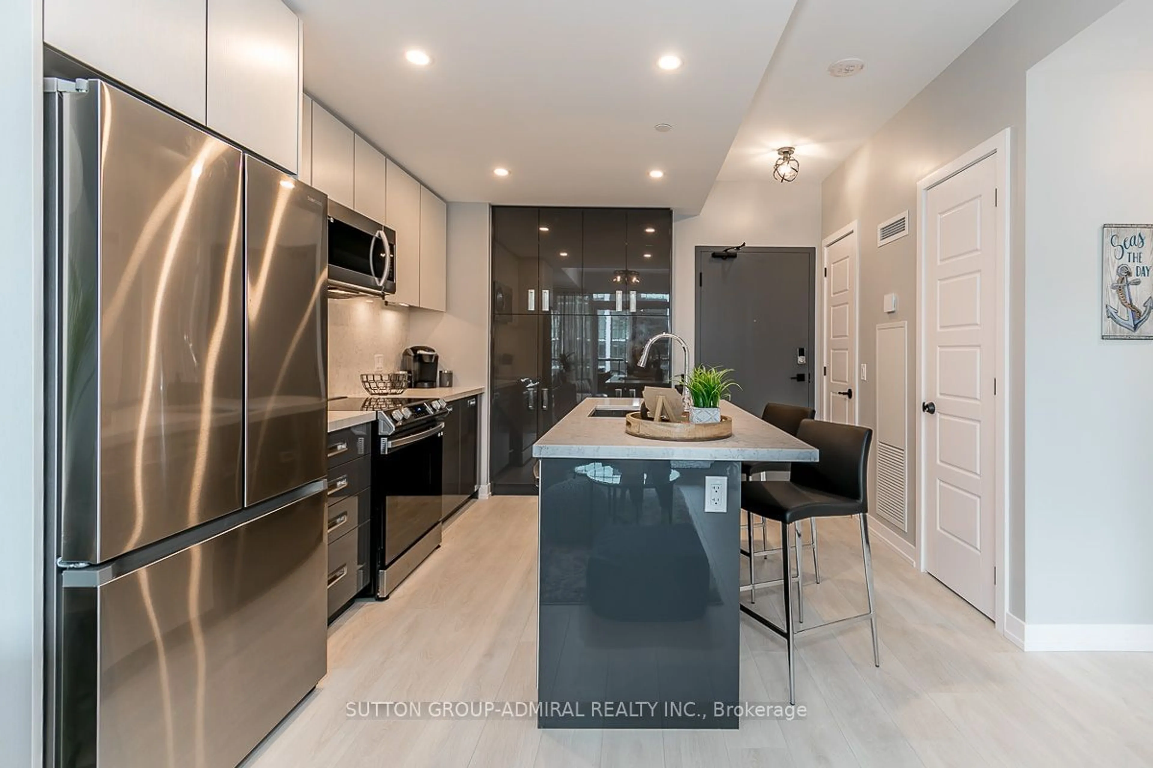 Open concept kitchen, ceramic/tile floor for 415 Sea Ray Ave #326, Innisfil Ontario L9S 0R5