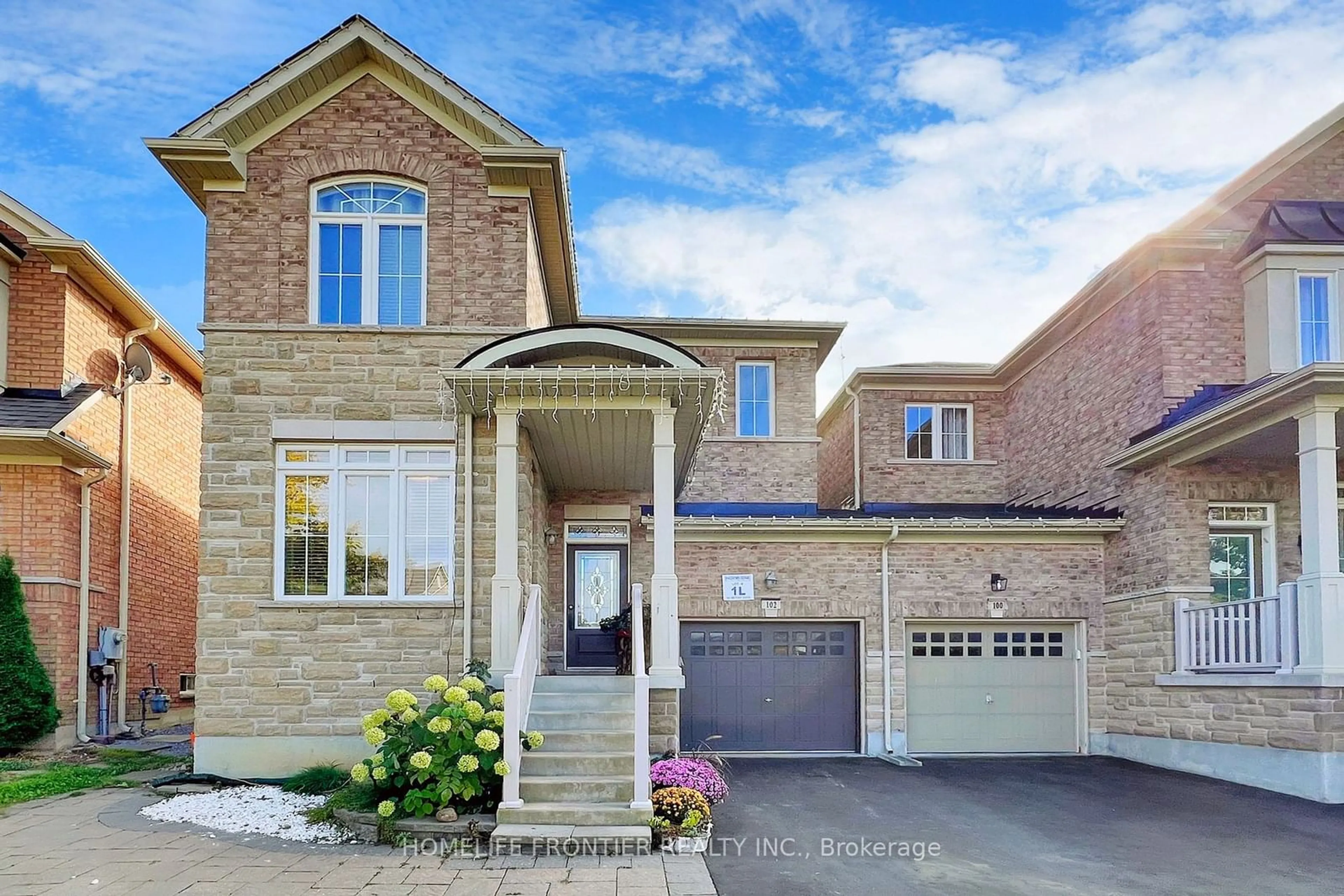 Home with brick exterior material, street for 102 Betony Dr, Richmond Hill Ontario L4E 0P5