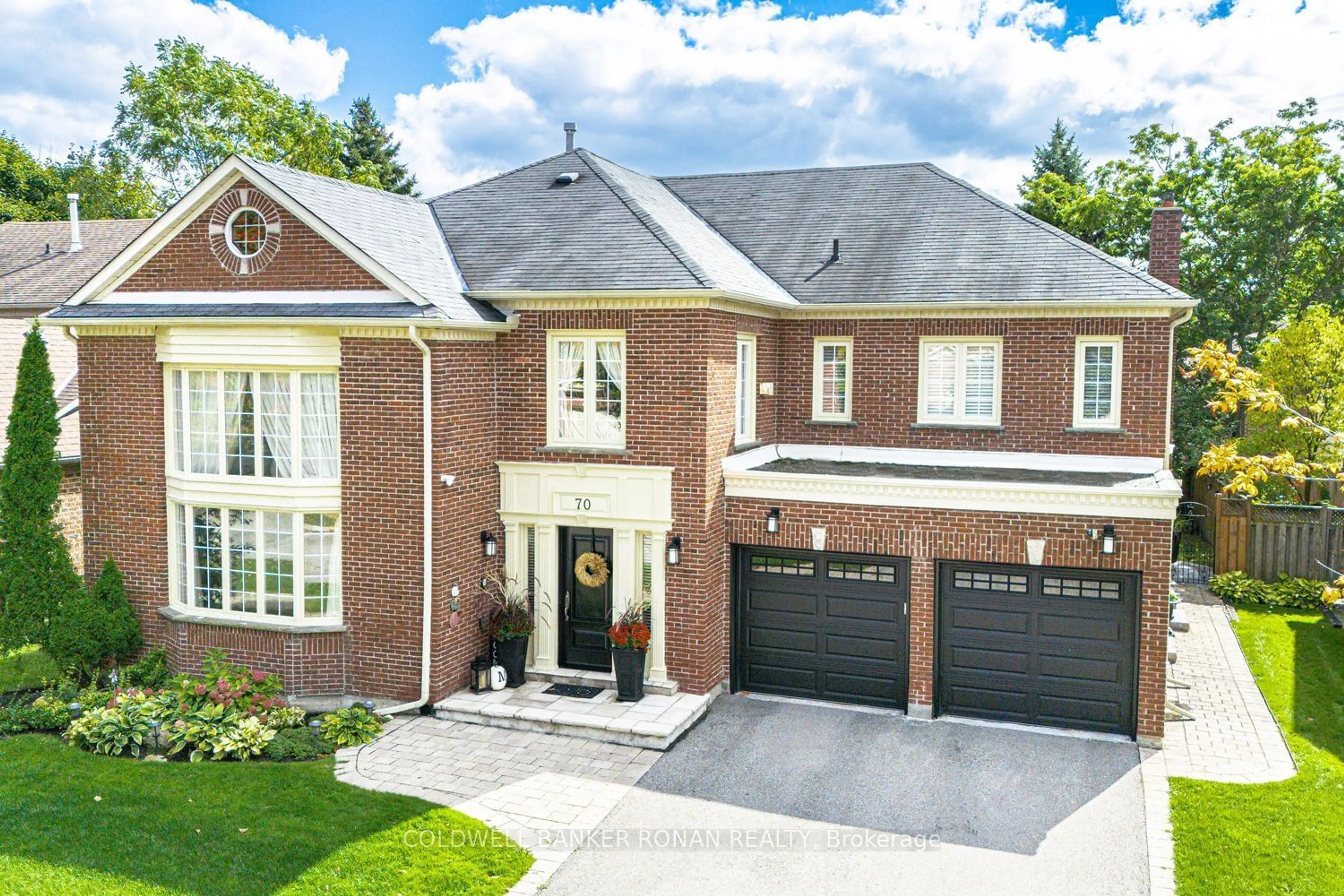 Home with brick exterior material, street for 70 Willett Cres, Richmond Hill Ontario L4C 7W3