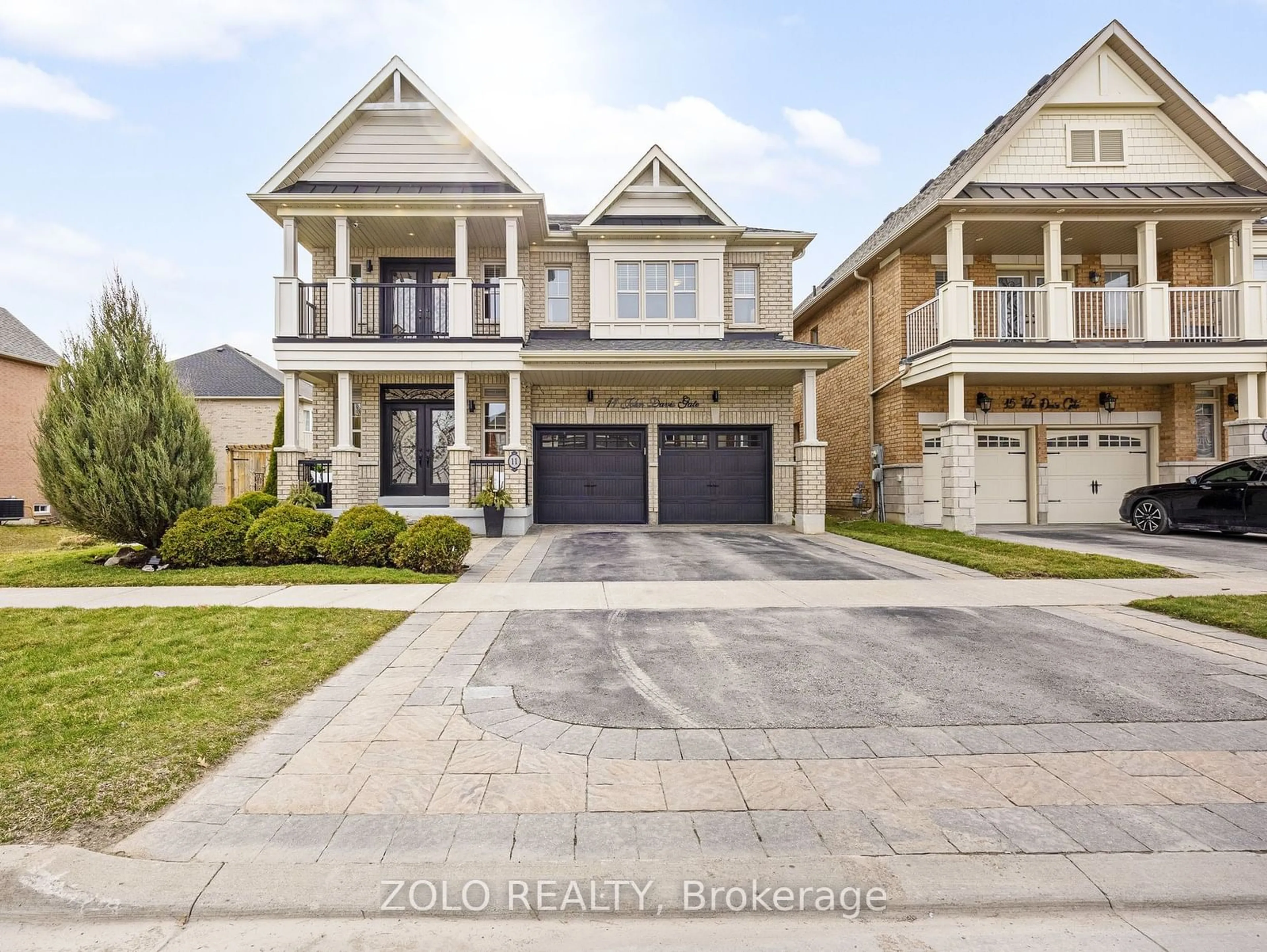 Home with brick exterior material, street for 11 John Davis Gate, Whitchurch-Stouffville Ontario L4A 1V5