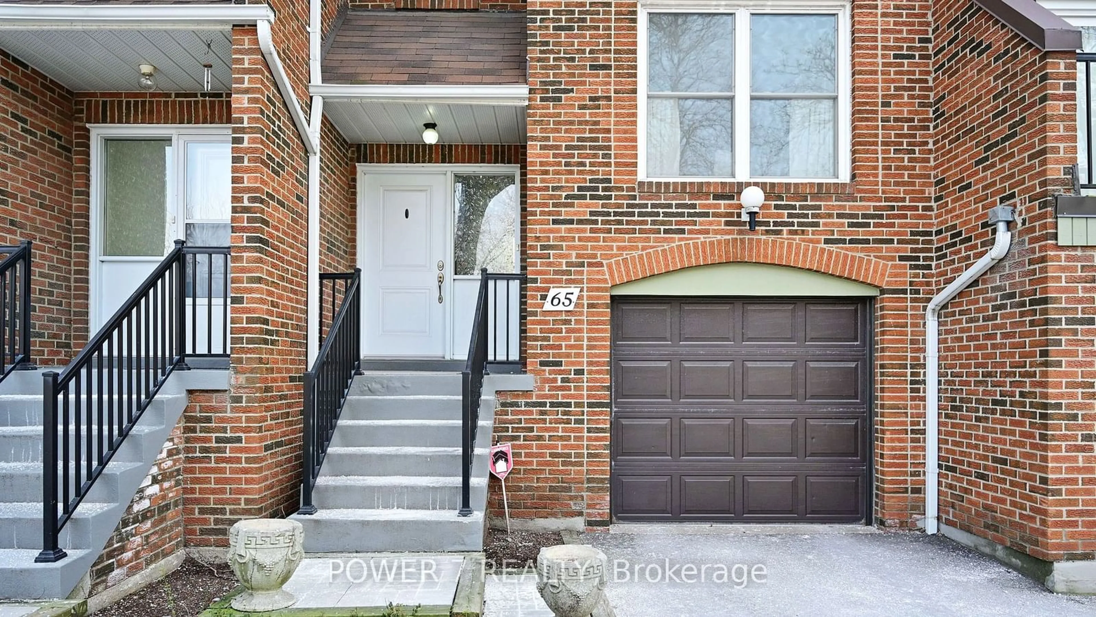 Home with brick exterior material, street for 65 Nottinghill Rd, Markham Ontario L3T 4Y3