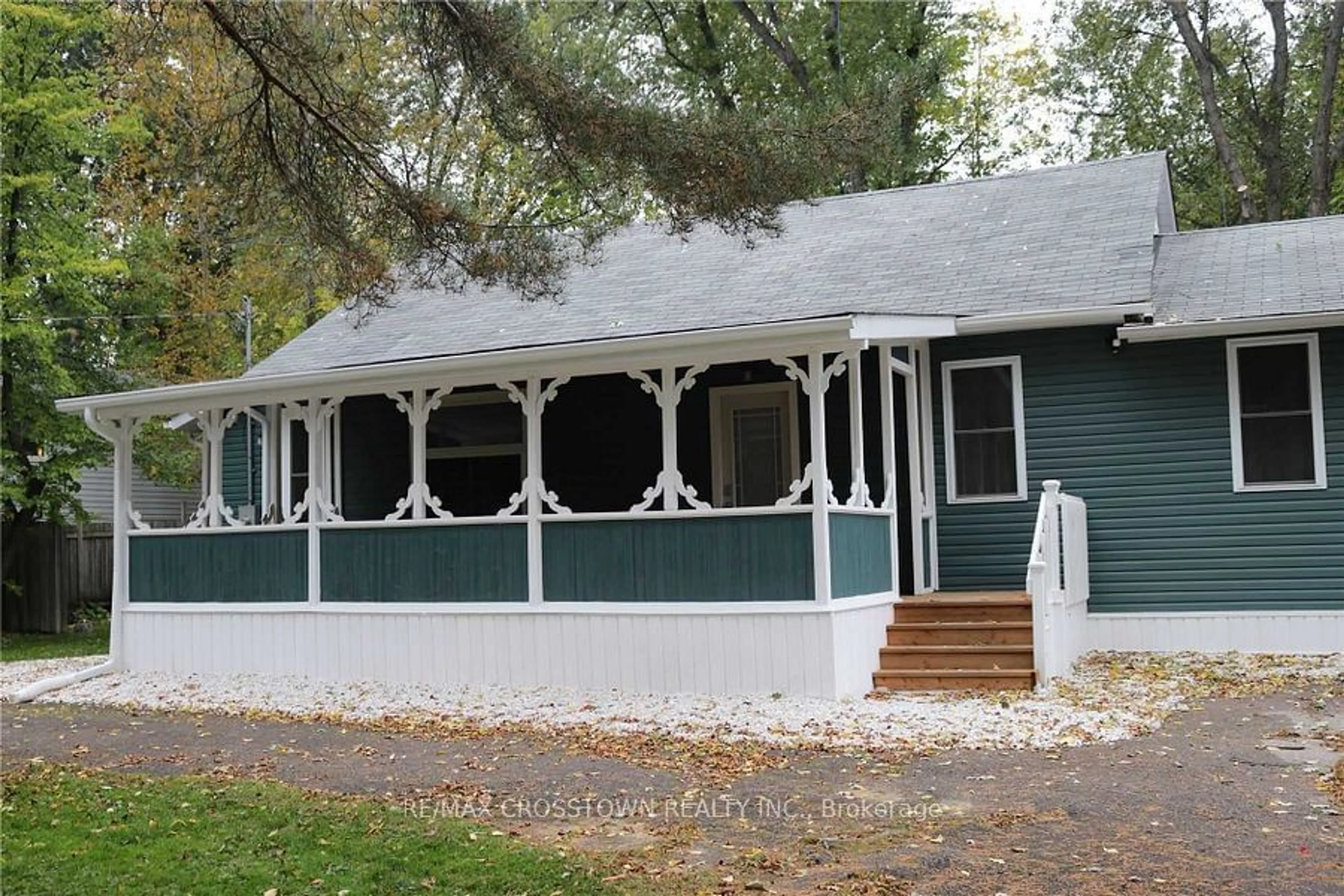 Home with vinyl exterior material, street for 1056 Elm Rd, Innisfil Ontario L9S 2E9