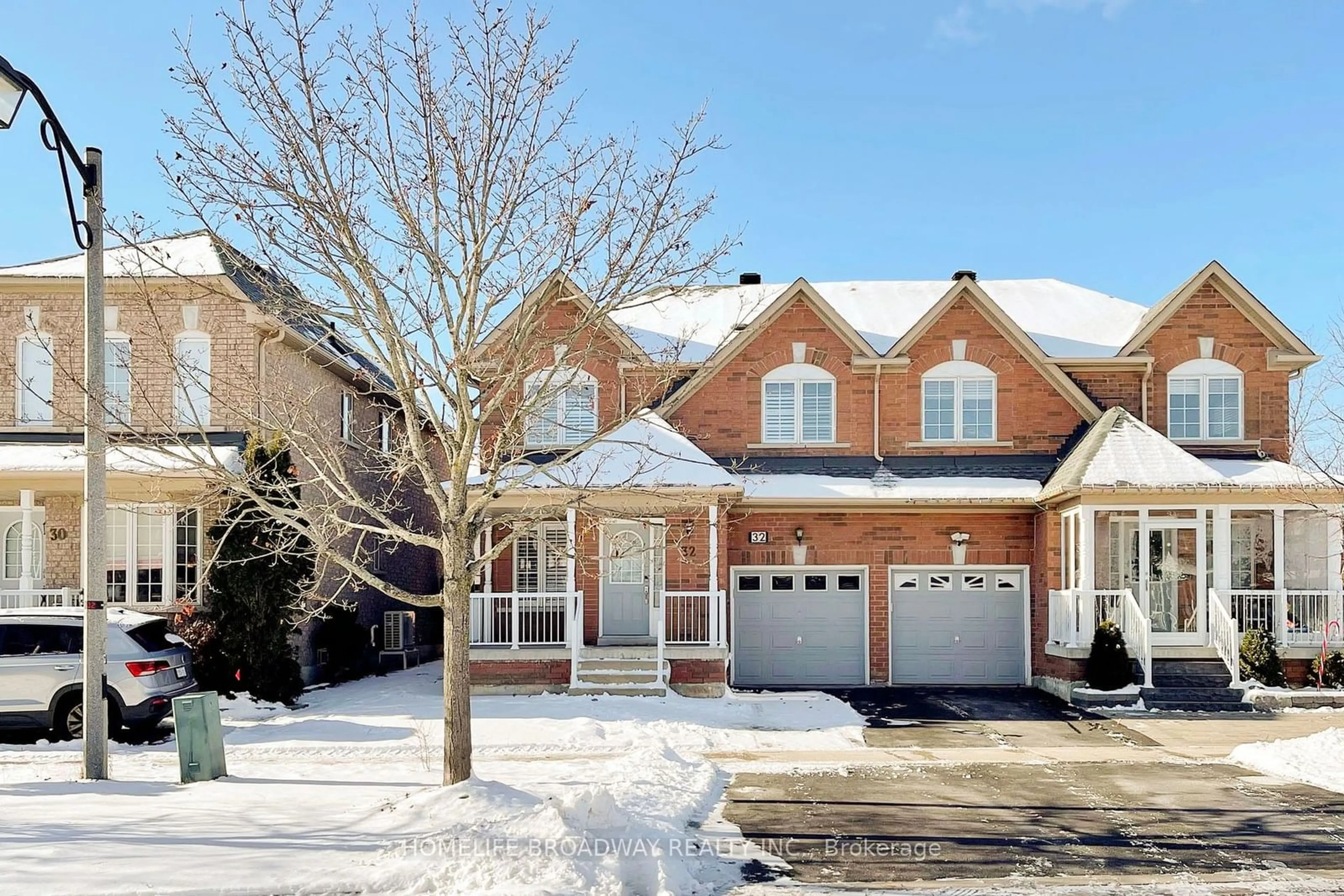 Home with brick exterior material, street for 32 Raintree Dr, Markham Ontario L3R 4X5