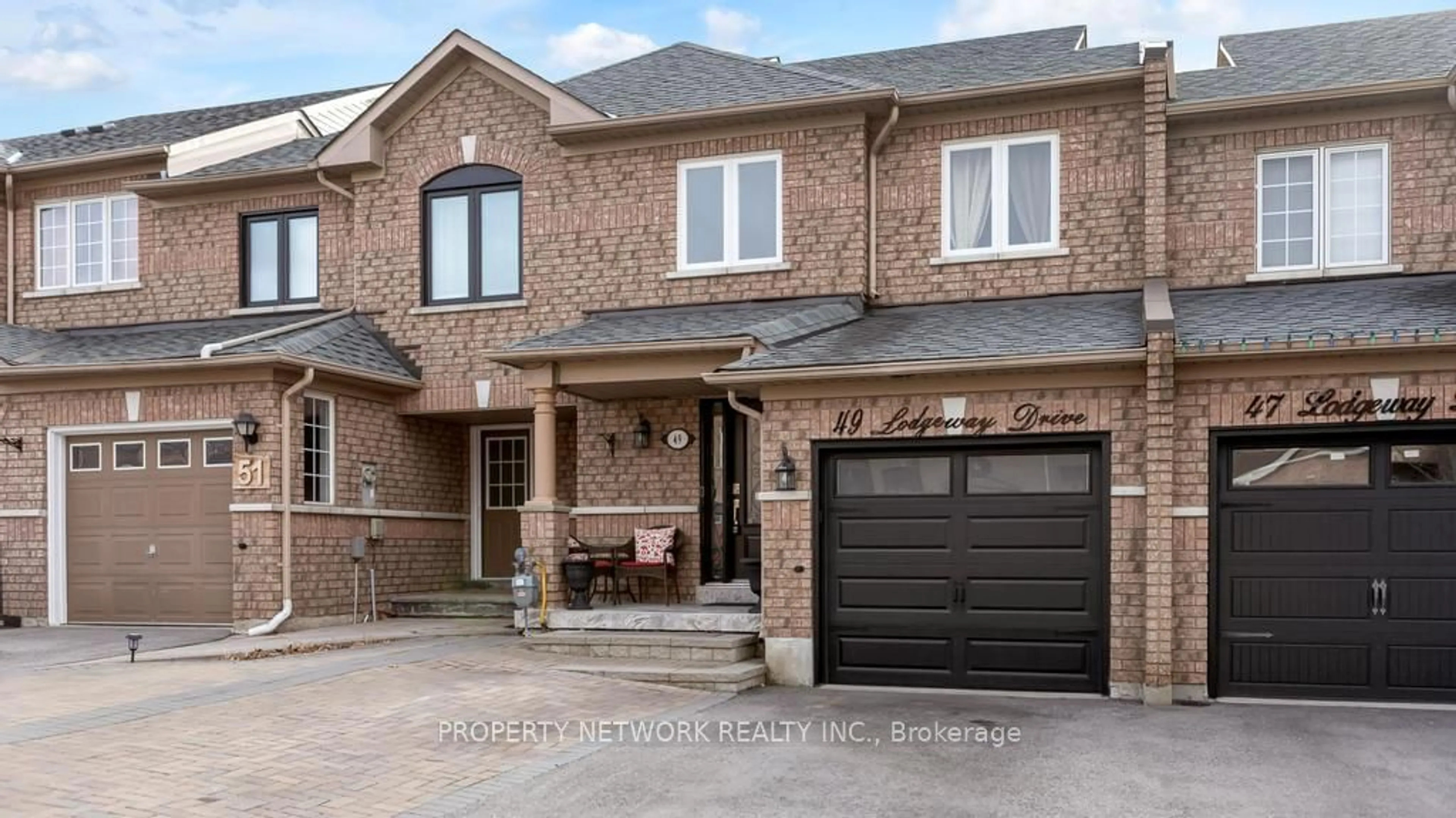 Home with brick exterior material, street for 49 Lodgeway Dr, Vaughan Ontario L6A 3S4