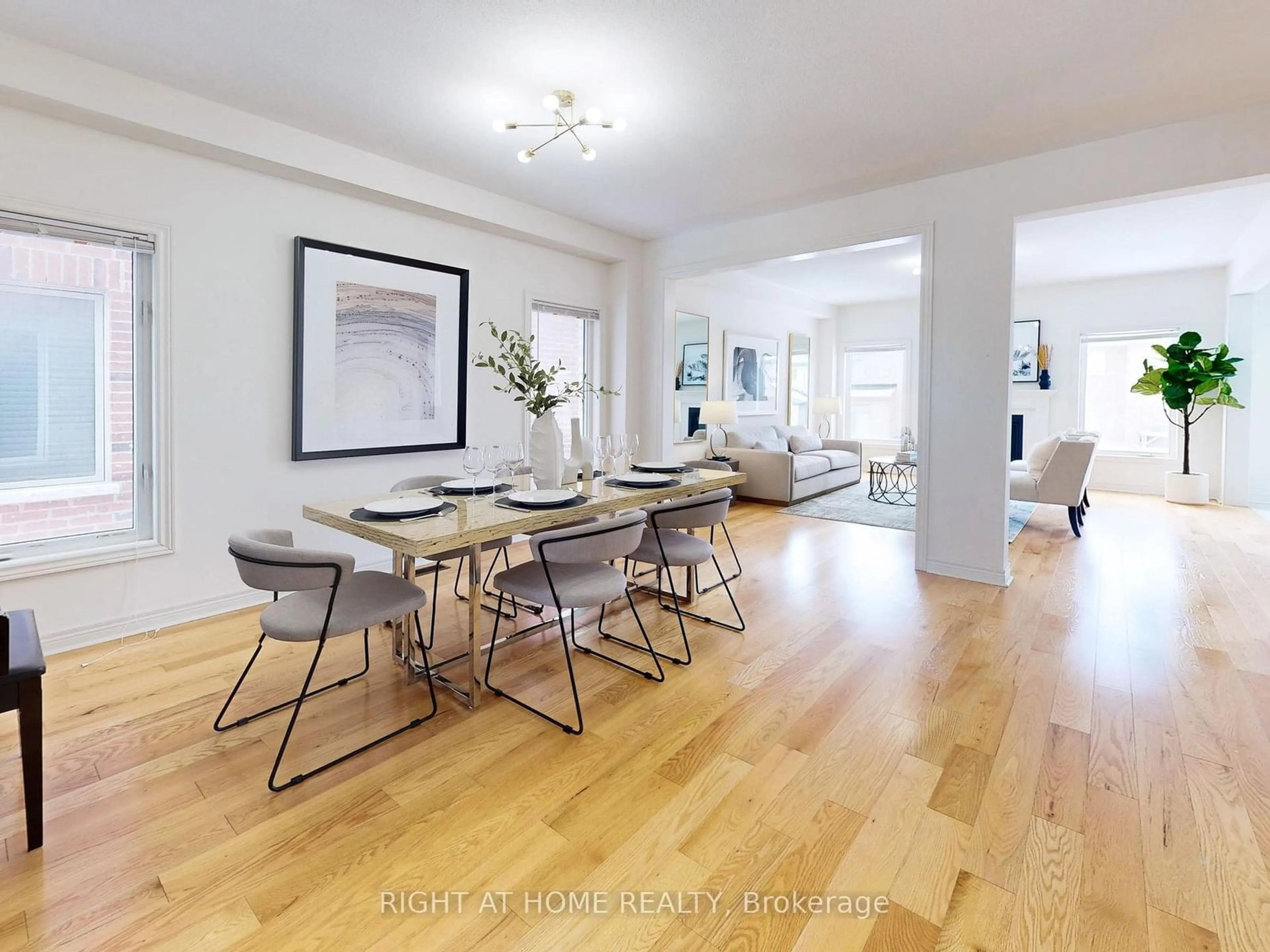 Dining room, wood/laminate floor for 38 Romanelli Cres, Bradford West Gwillimbury Ontario L3Z 0X7