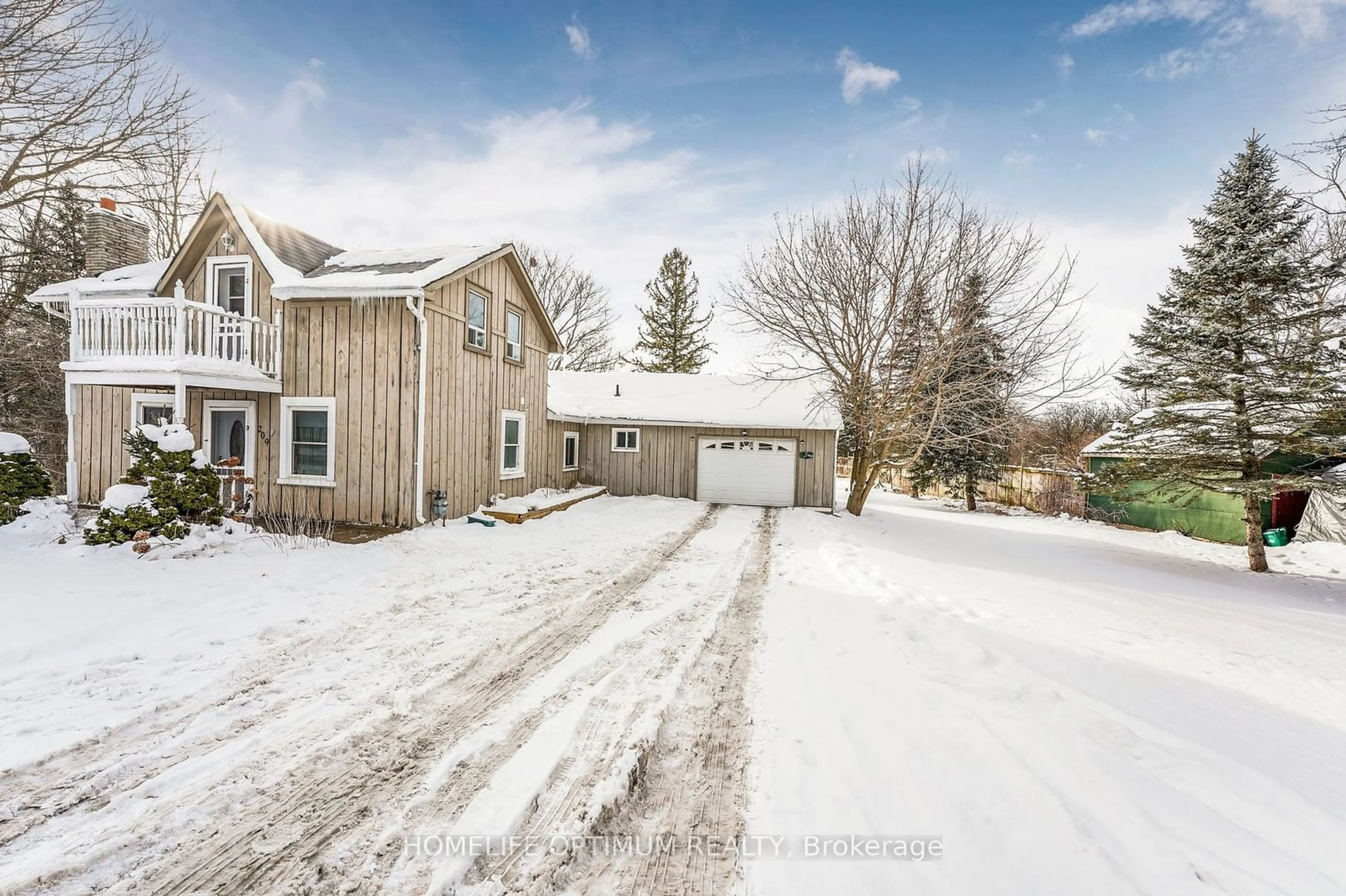 A pic from outside/outdoor area/front of a property/back of a property/a pic from drone, street for 209 Barrie St, Essa Ontario L0L 2N0