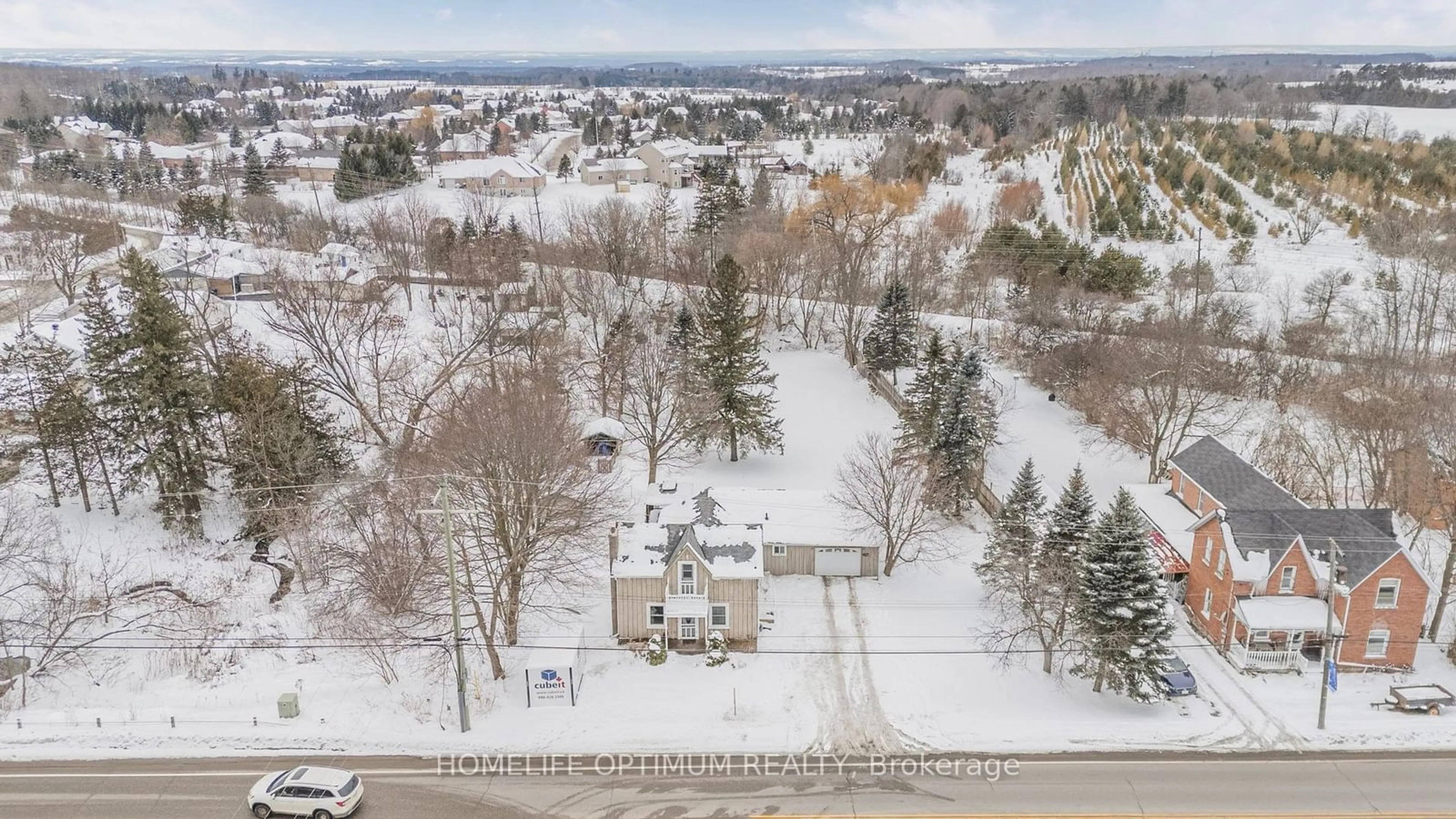 A pic from outside/outdoor area/front of a property/back of a property/a pic from drone, street for 209 Barrie St, Essa Ontario L0L 2N0