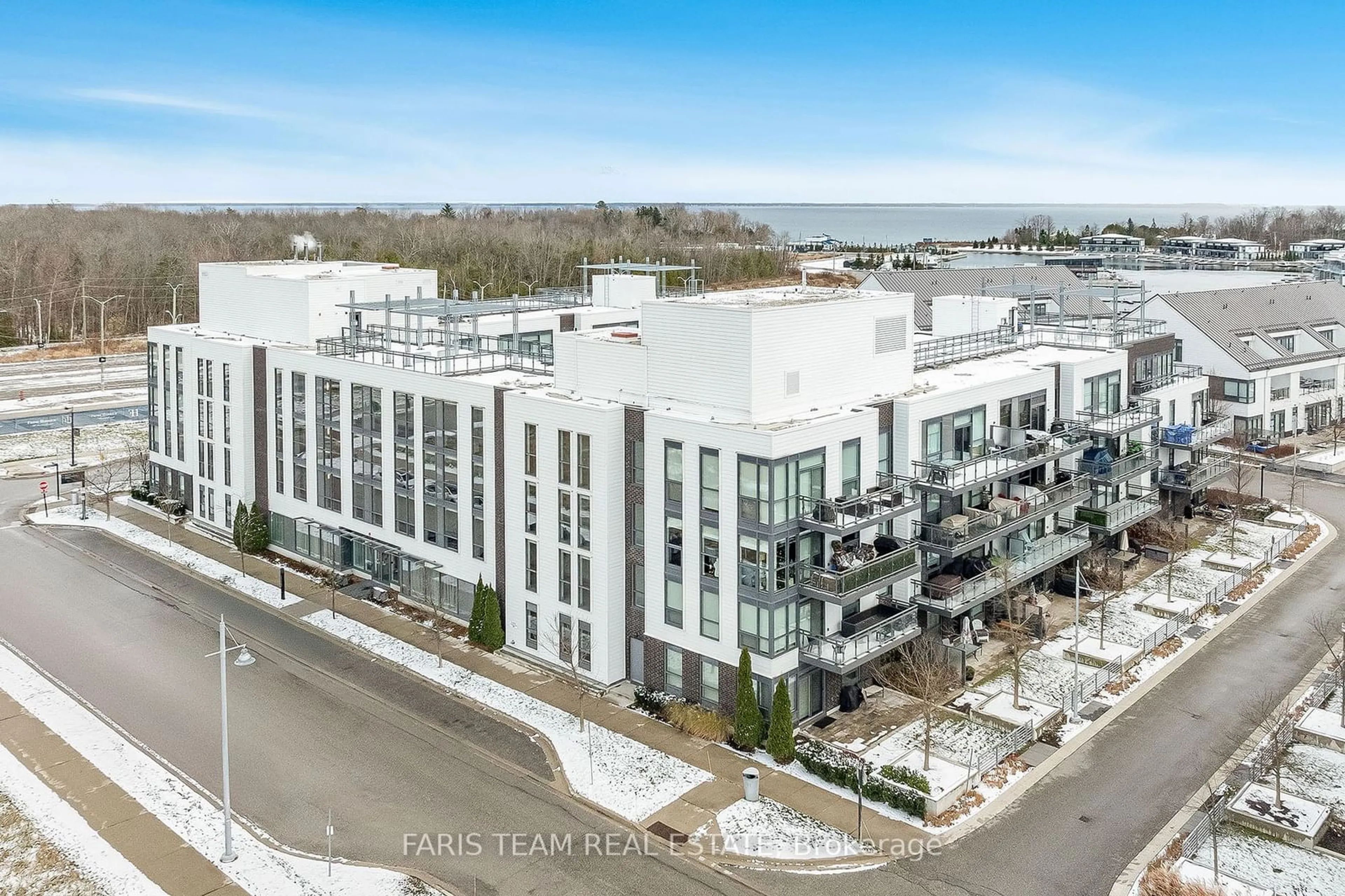 A pic from outside/outdoor area/front of a property/back of a property/a pic from drone, city buildings view from balcony for 241 Sea Ray Ave #305, Innisfil Ontario L9S 0L9