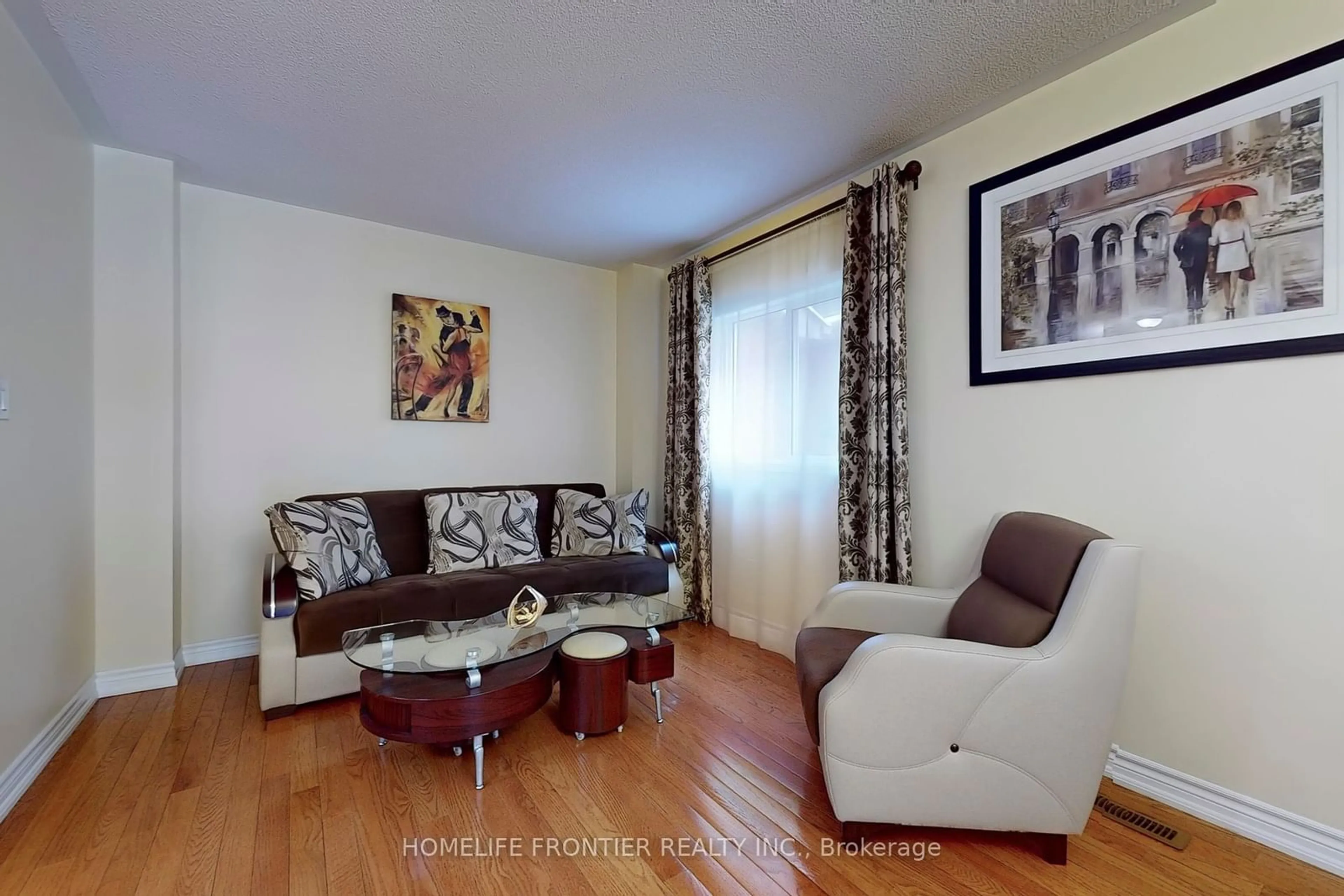 Living room with furniture, wood/laminate floor for 271 Austinpaul Dr, Newmarket Ontario L3X 2C3