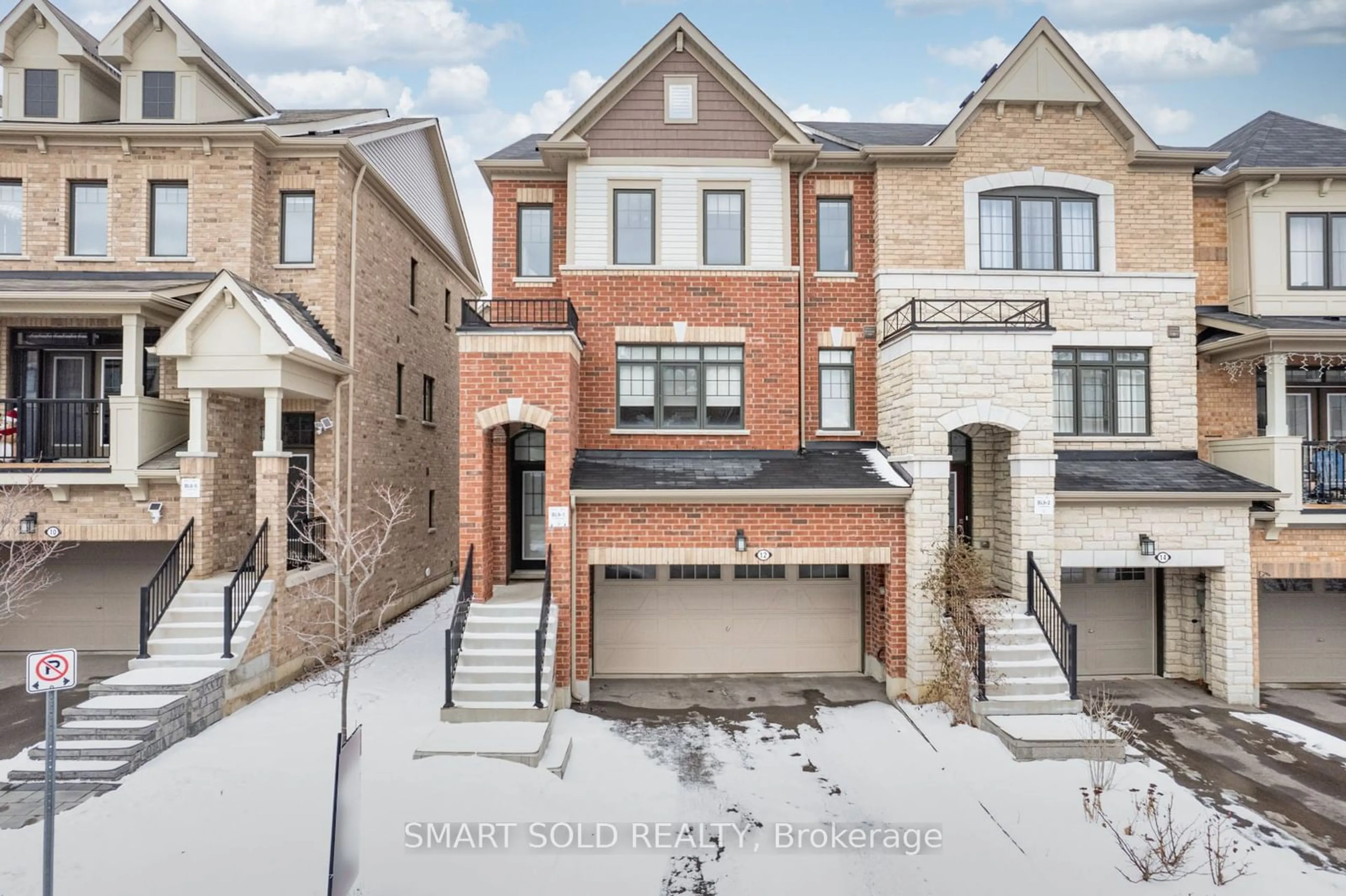 Home with brick exterior material, street for 12 Fraleigh Ave, Markham Ontario L6C 0Y9