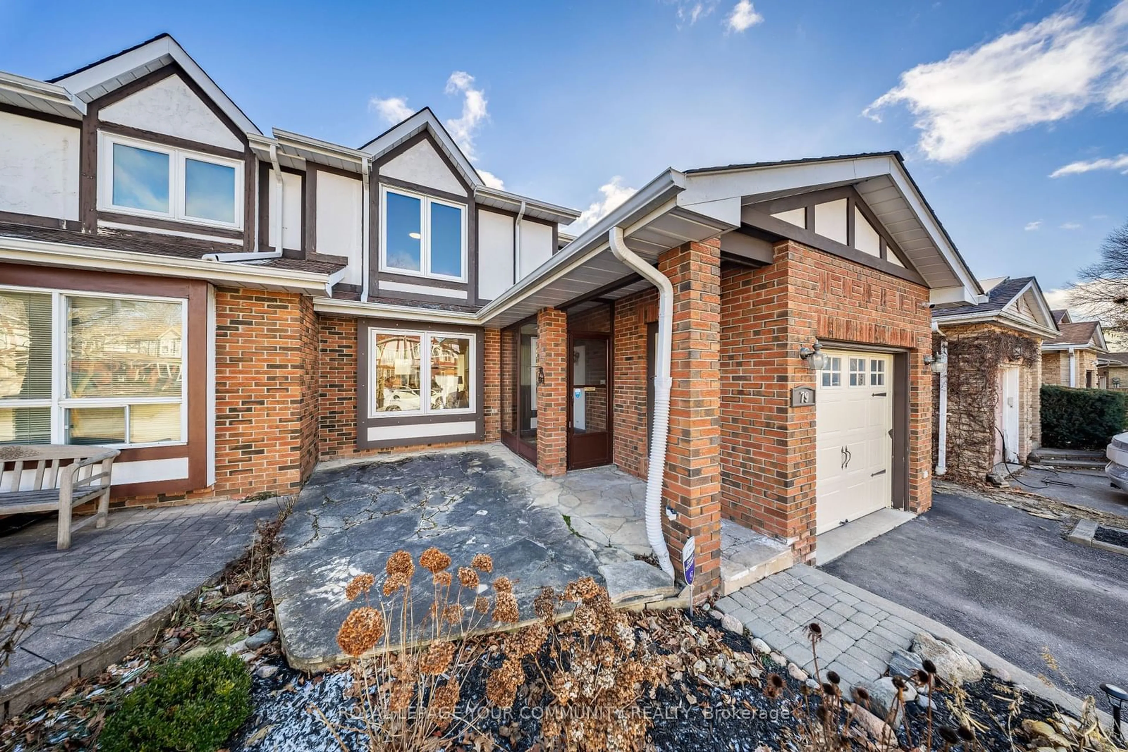 Home with brick exterior material, street for 79 Tamarack Dr, Markham Ontario L3T 4W2