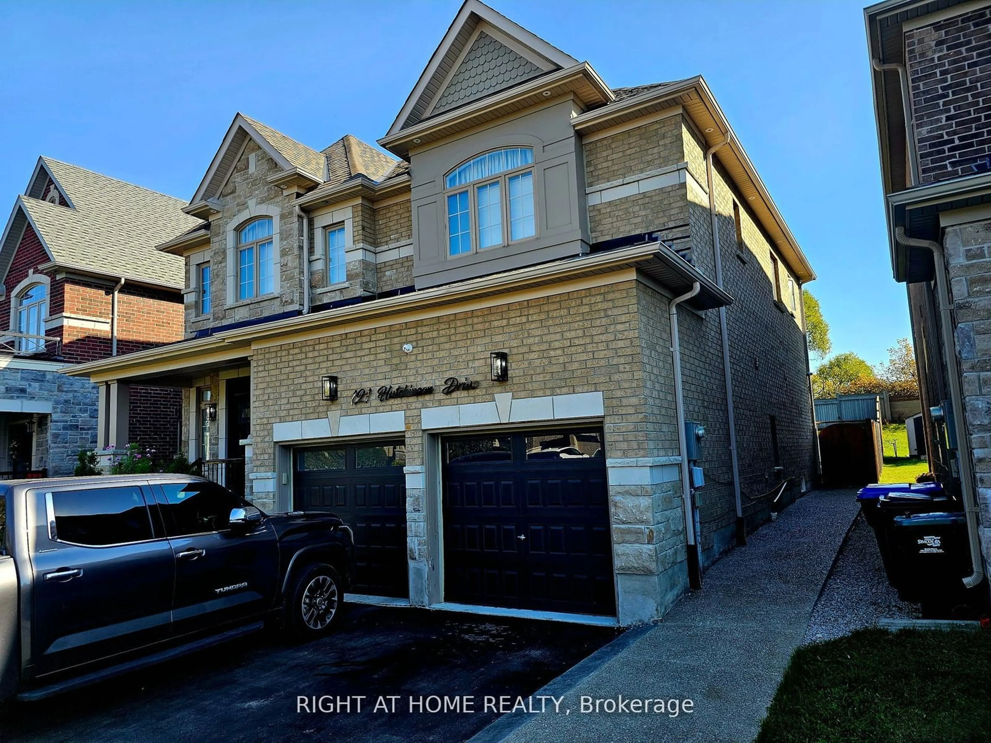 Home with brick exterior material, street for 121 Hutchinson Dr, New Tecumseth Ontario L9R 0P6