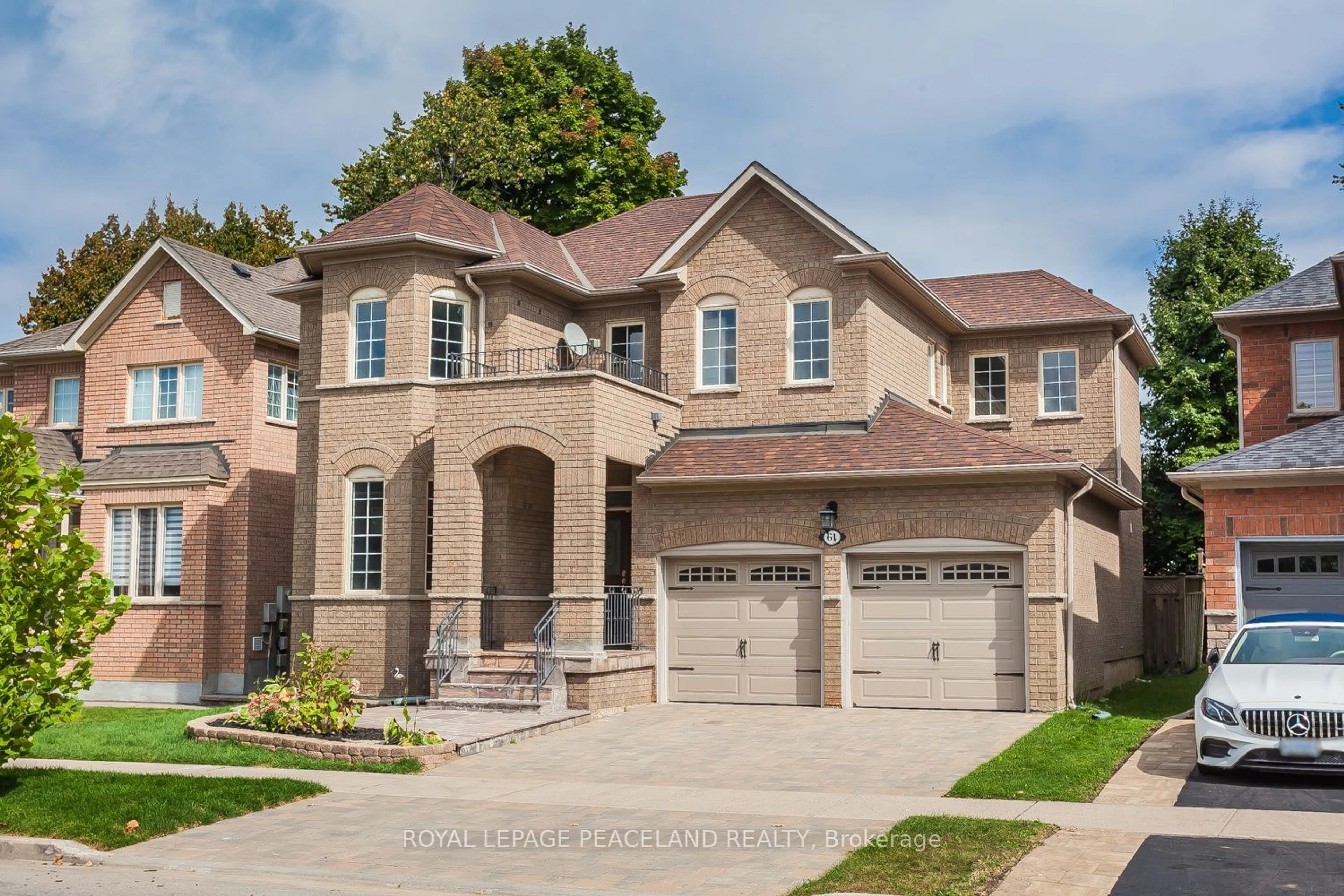 Home with brick exterior material, street for 61 Grand Oak Dr, Richmond Hill Ontario L4E 4A2