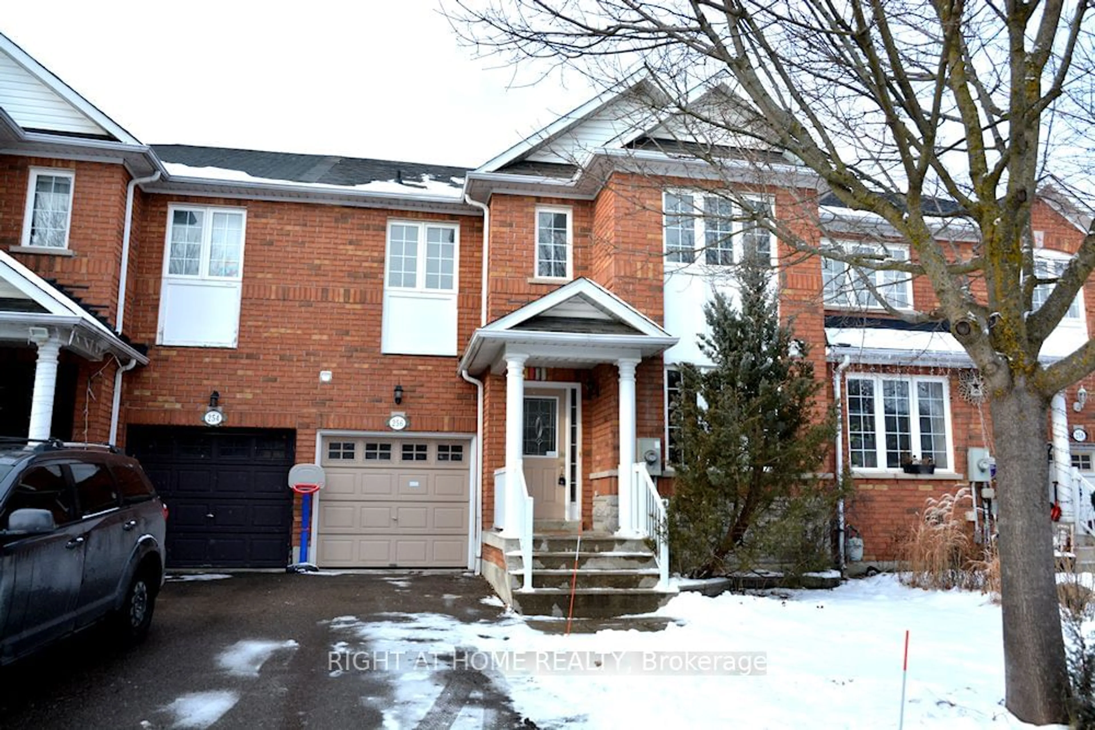 Home with brick exterior material, street for 256 Flagstone Way, Newmarket Ontario L3X 2Y1