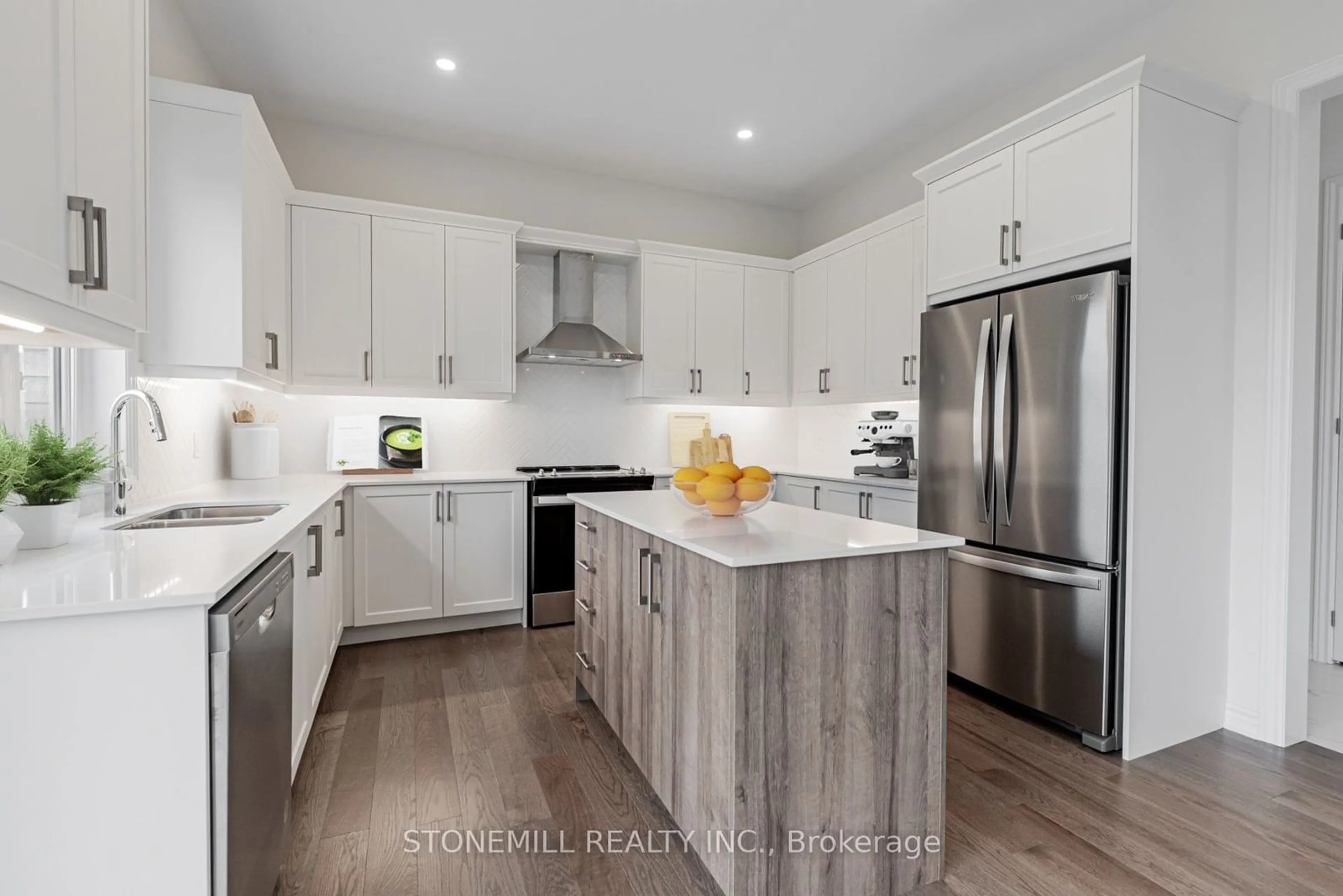 Open concept kitchen, wood/laminate floor for 97 Denney Dr, Essa Ontario L0M 1B0