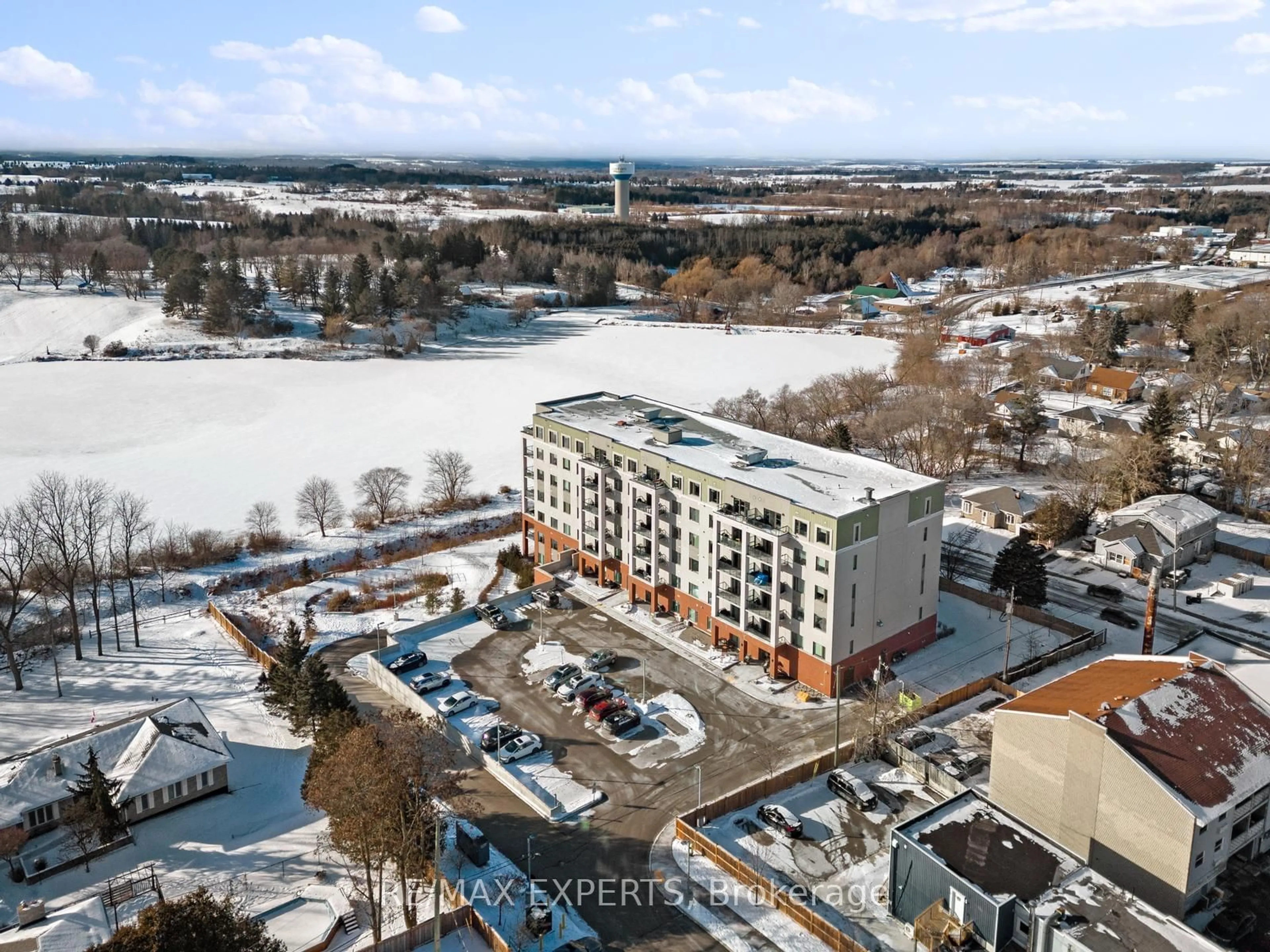 A pic from outside/outdoor area/front of a property/back of a property/a pic from drone, city buildings view from balcony for 64 Queen St #205, New Tecumseth Ontario L0G 1W0