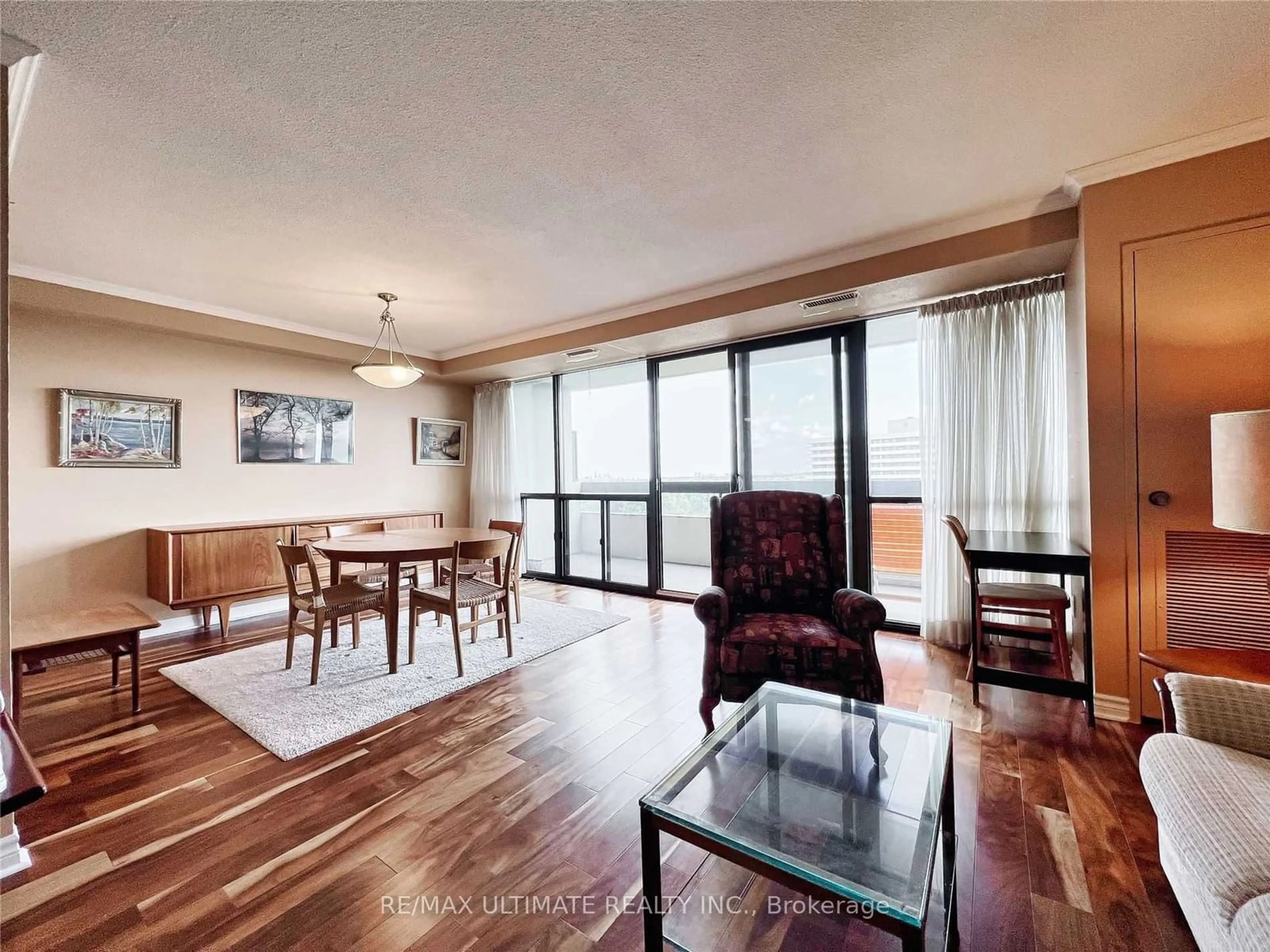 Living room with furniture, wood/laminate floor for 8111 Yonge St #912, Markham Ontario L3T 4V9