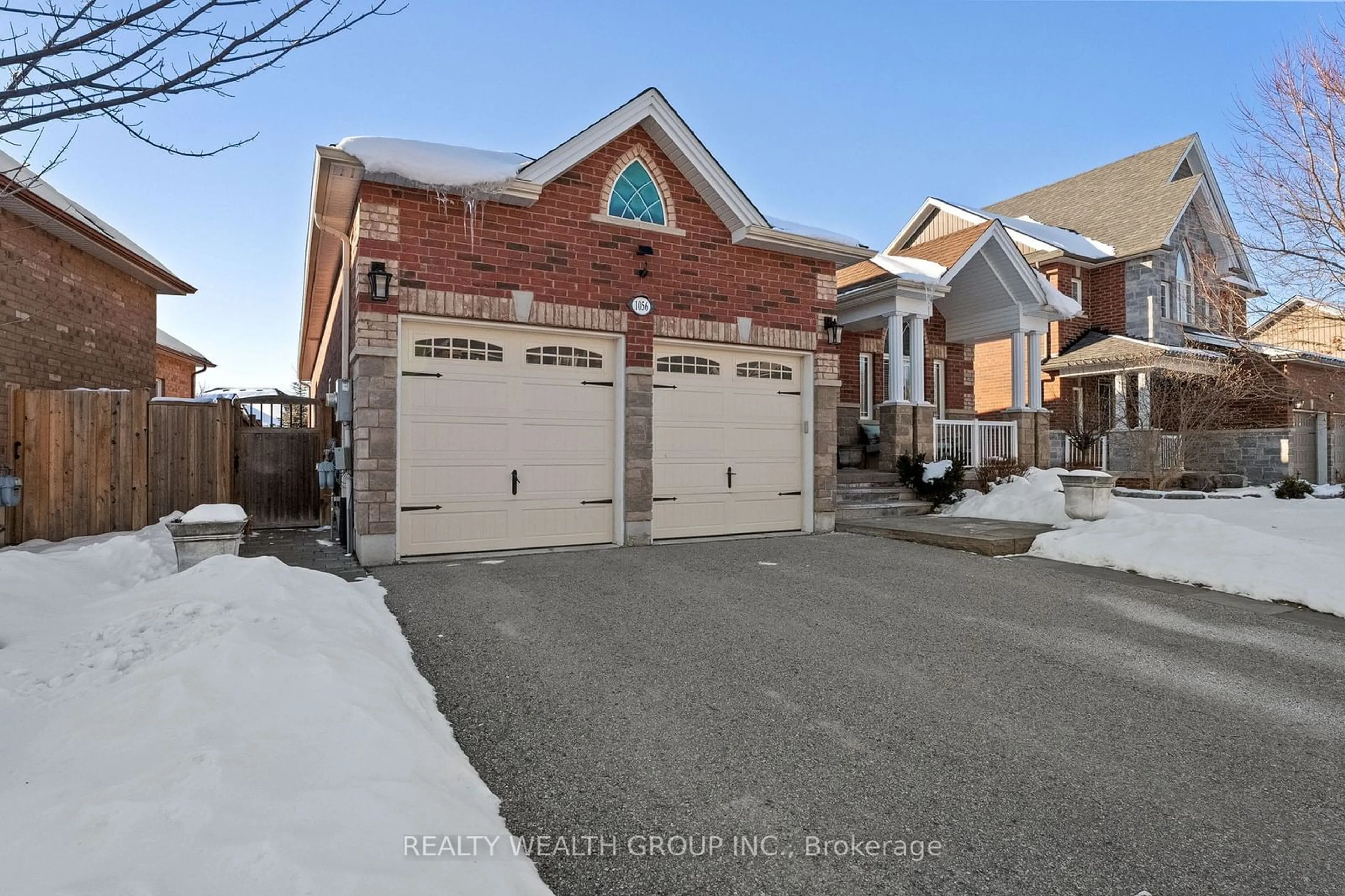 Home with brick exterior material, street for 1056 Quarry Dr, Innisfil Ontario L9S 4X1