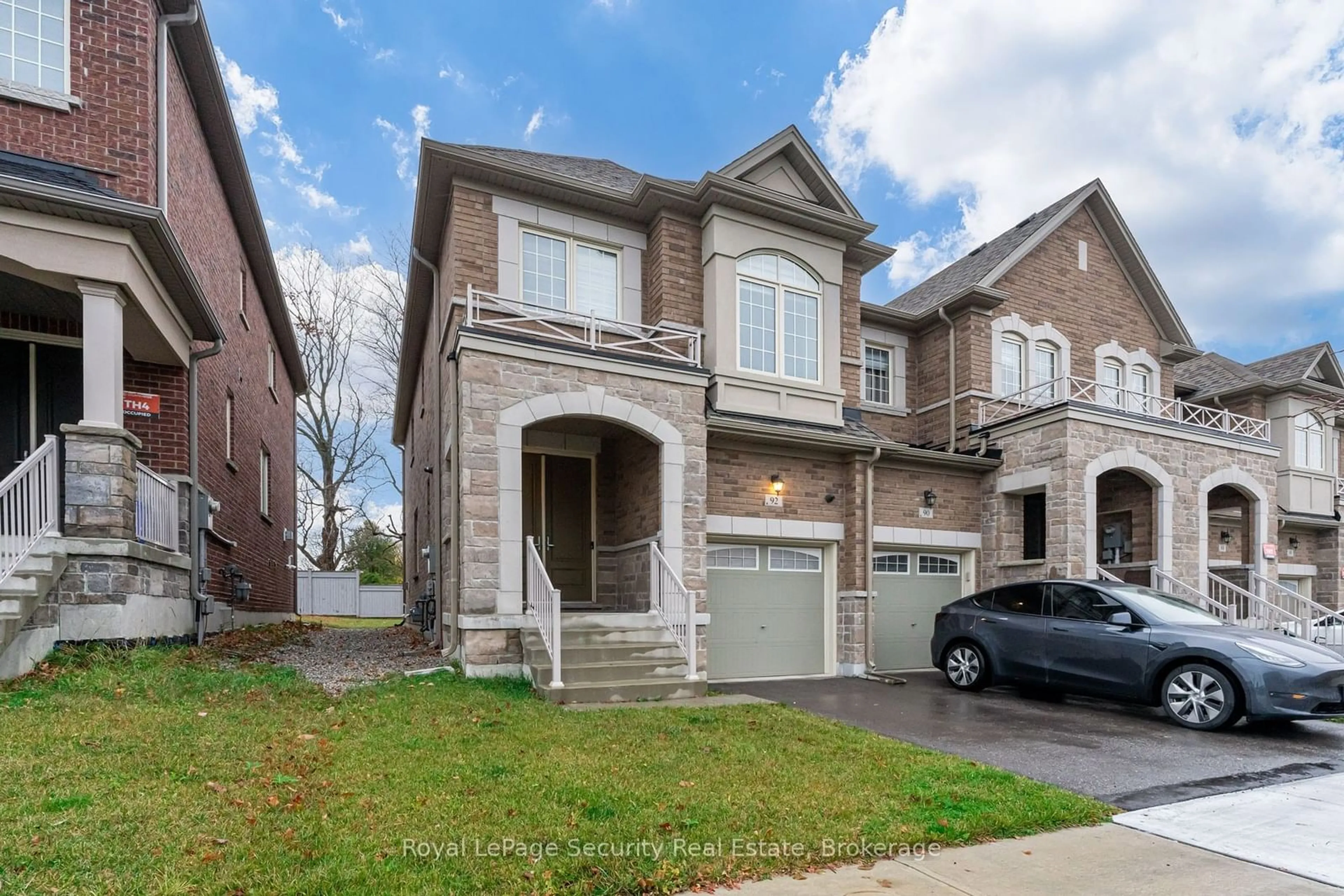 Home with brick exterior material, street for 92 Drizzel Cres, Richmond Hill Ontario L4E 2Z1