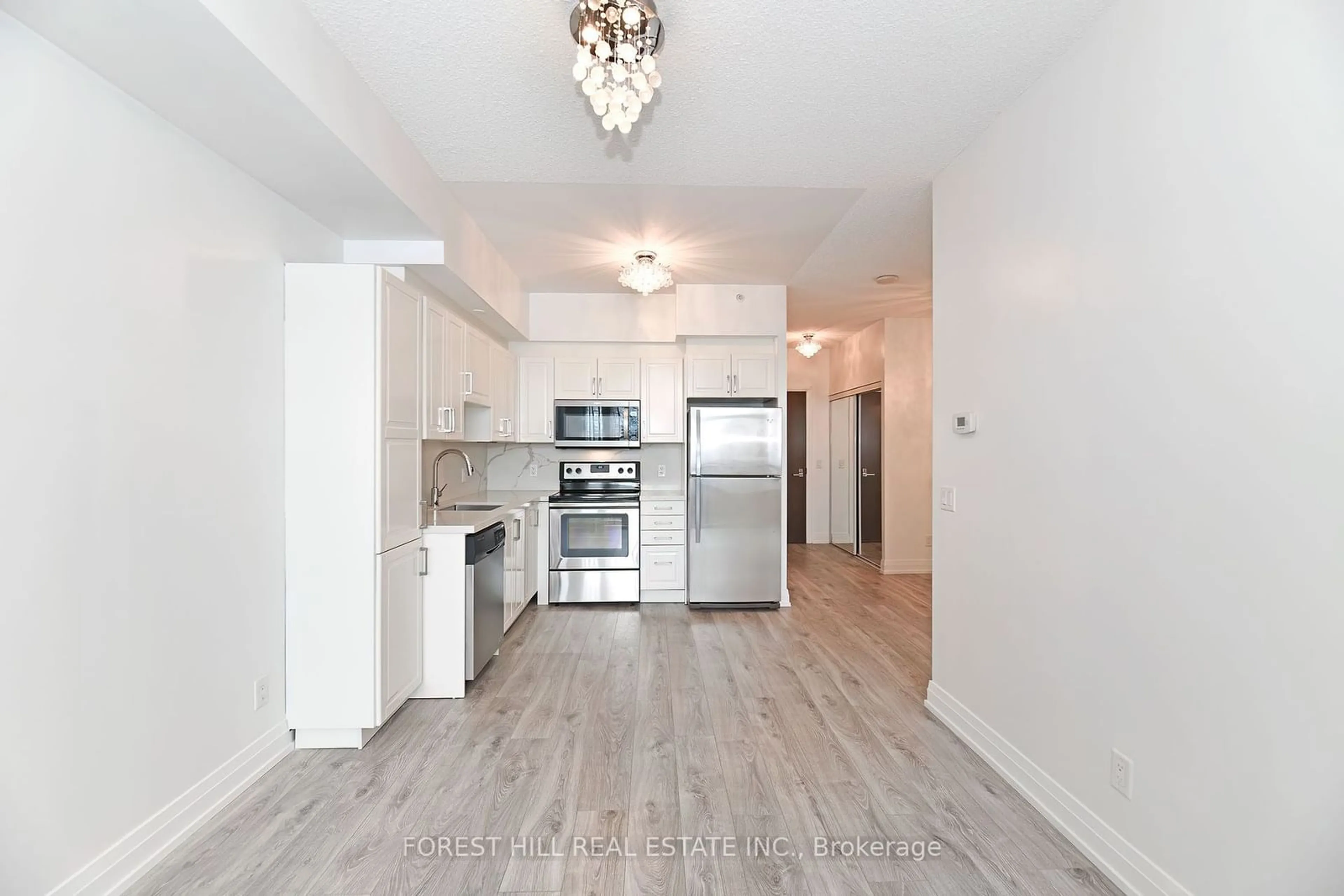 Open concept kitchen, wood/laminate floor for 85 North Park Rd #806, Vaughan Ontario L4J 0H9