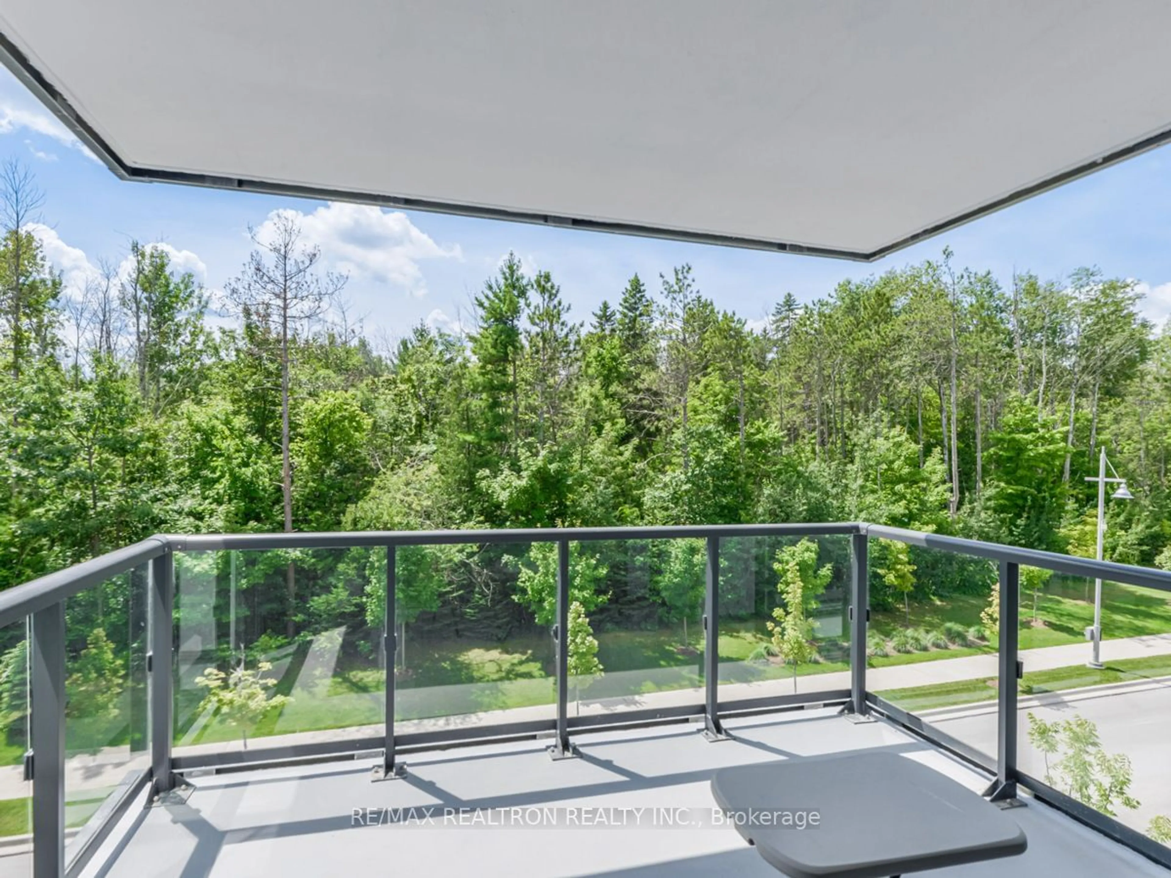 Balcony in the apartment, forest/trees view for 415 Sea Ray Ave #348, Innisfil Ontario L9S 0N9