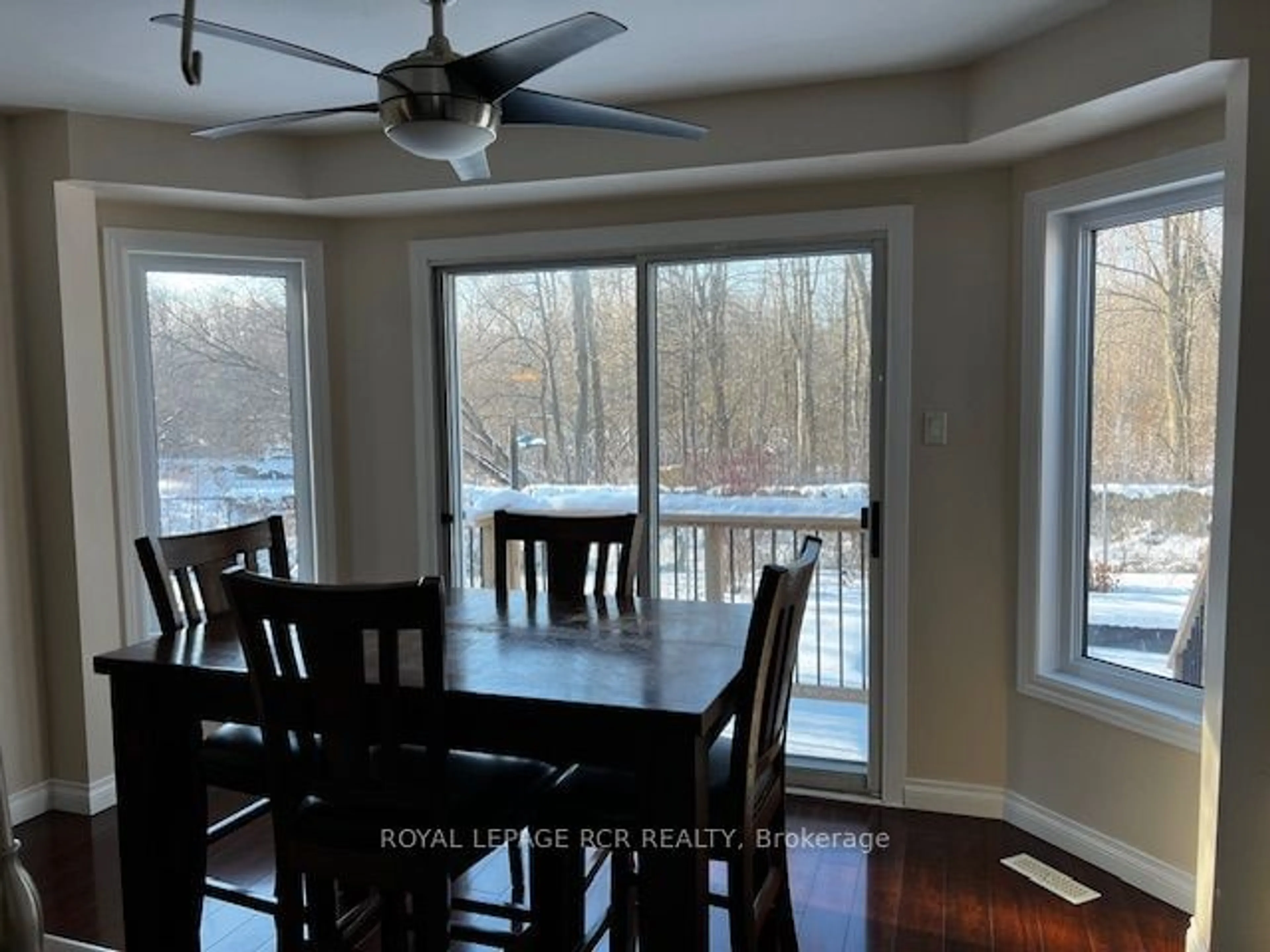 Dining room, wood/laminate floor for 64 Edenbridge Dr, Essa Ontario L0M 1B3