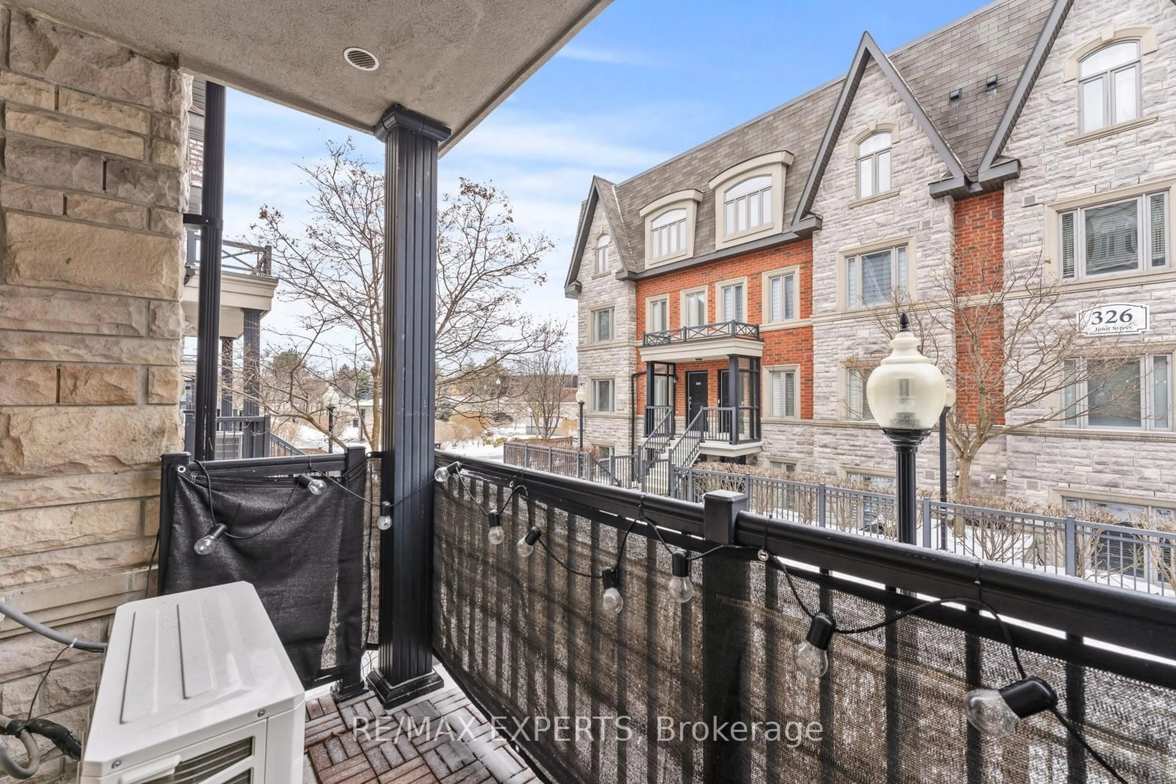 Balcony in the apartment, city buildings view from balcony for 318 John St #249, Markham Ontario L3T 0B1