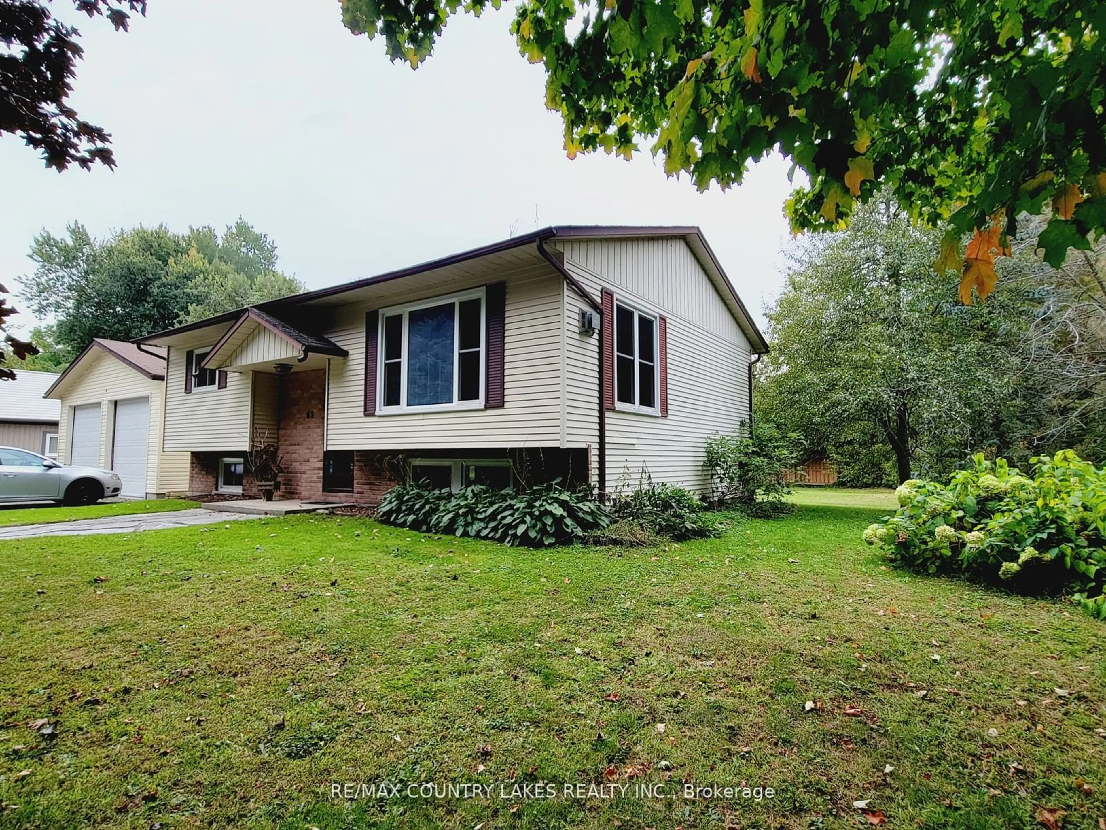 Home with vinyl exterior material, street for 61 Seventh St, Brock Ontario L0K 1A0