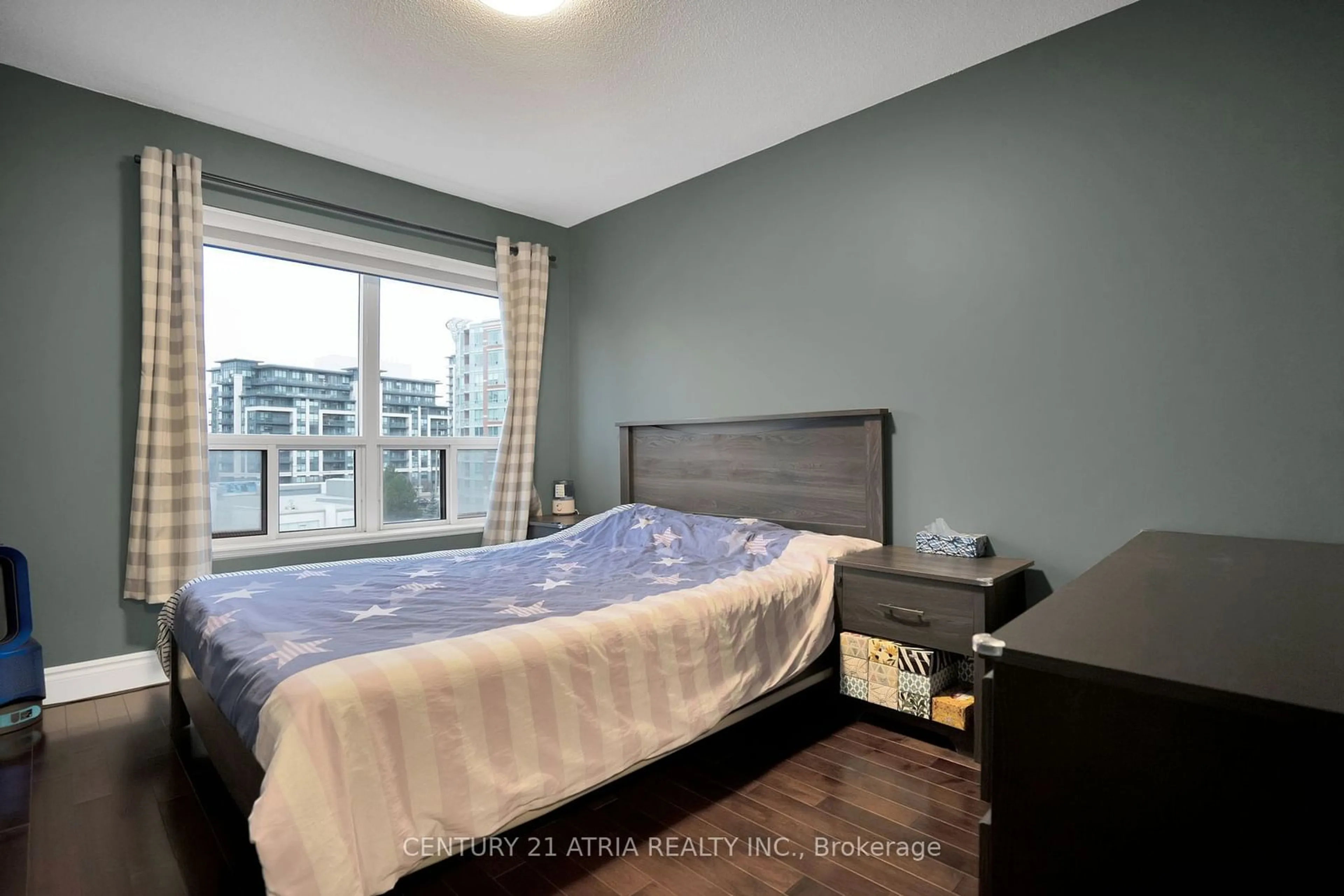 Bedroom with bed, wood/laminate floor for 51 Saddlecreek Dr #610, Markham Ontario L3T 7Z1