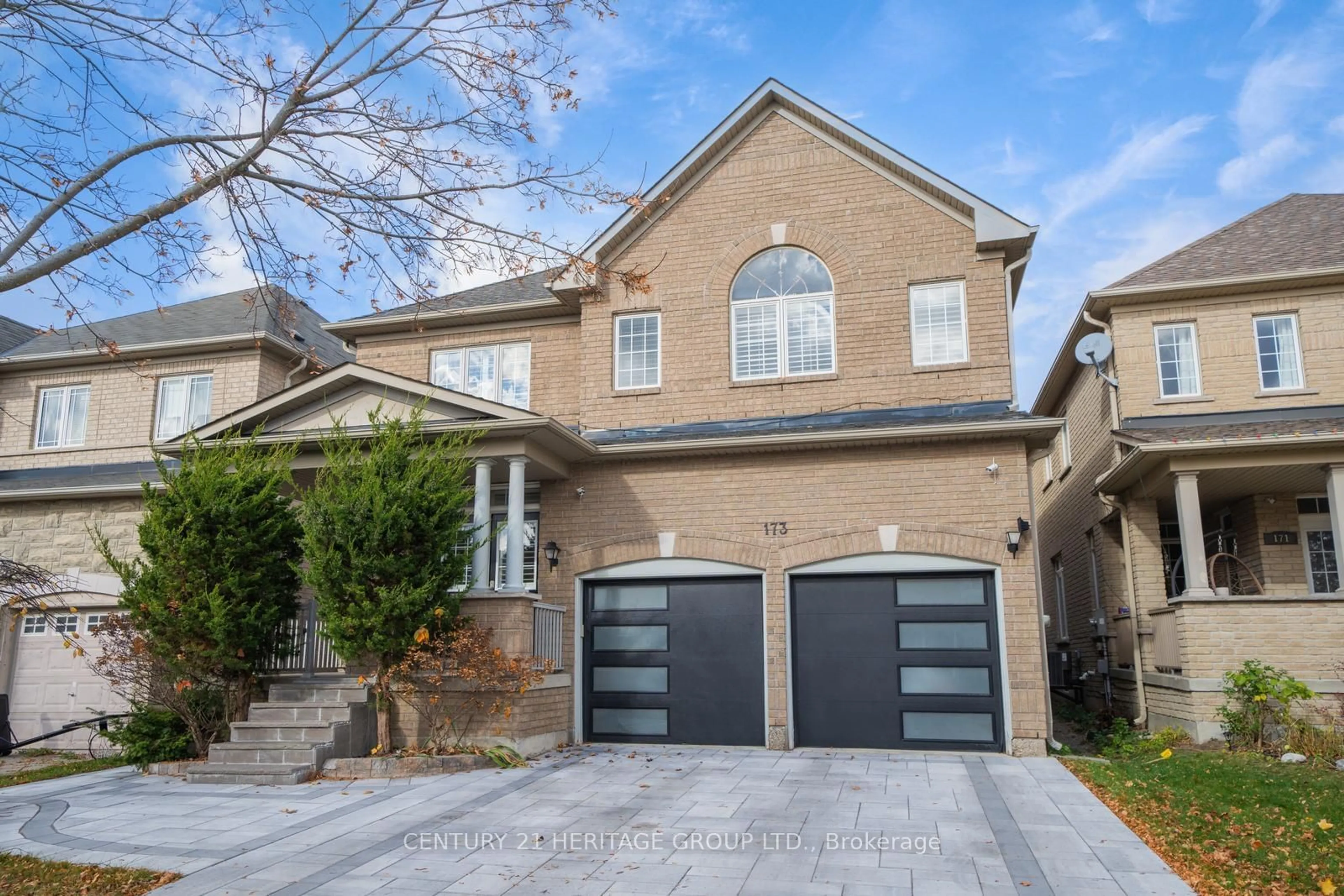 Home with brick exterior material, street for 173 Wainscot Ave, Newmarket Ontario L3X 2X4