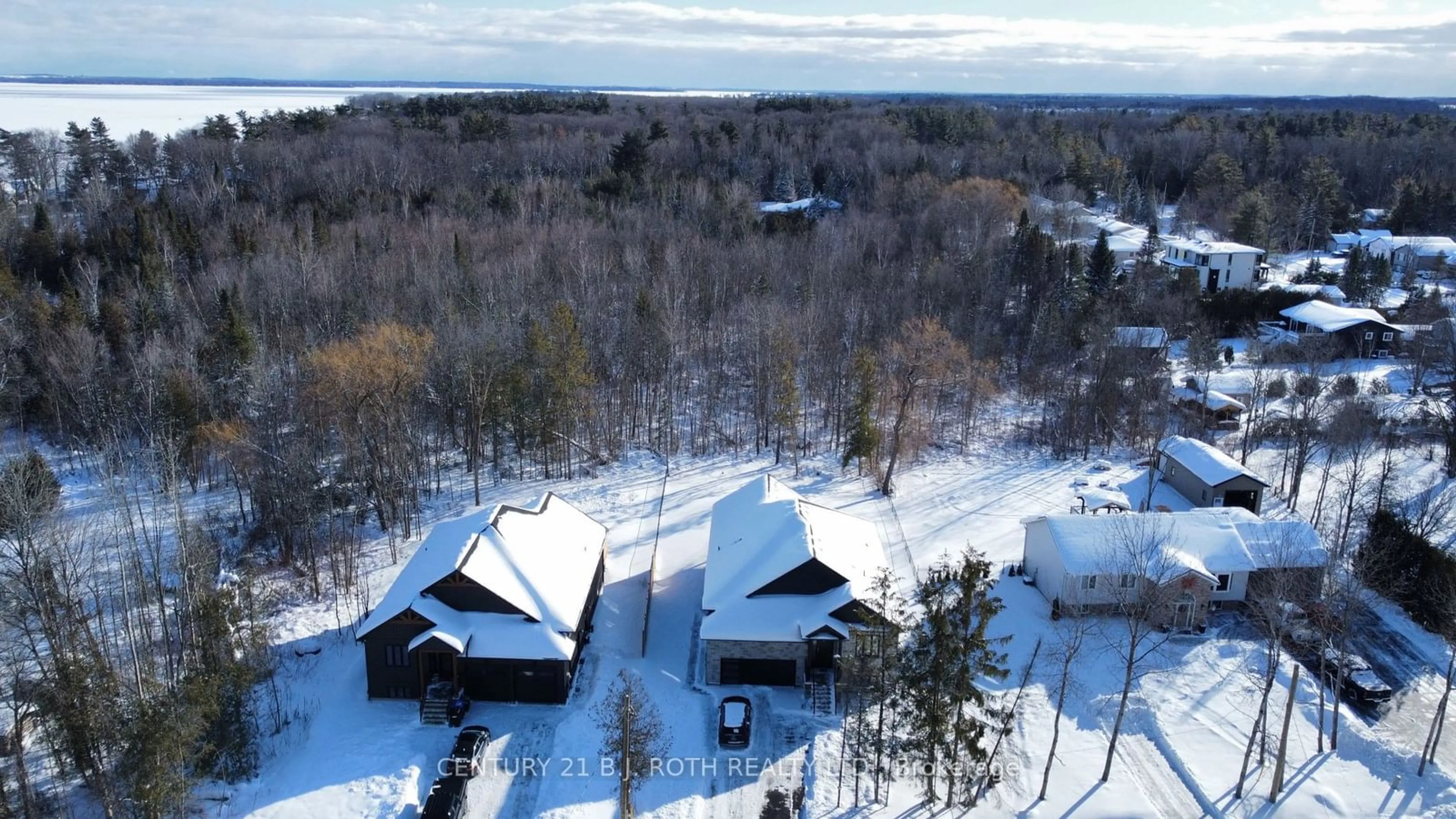 A pic from outside/outdoor area/front of a property/back of a property/a pic from drone, water/lake/river/ocean view for 527 Mapleview Dr, Innisfil Ontario L9S 2Z4