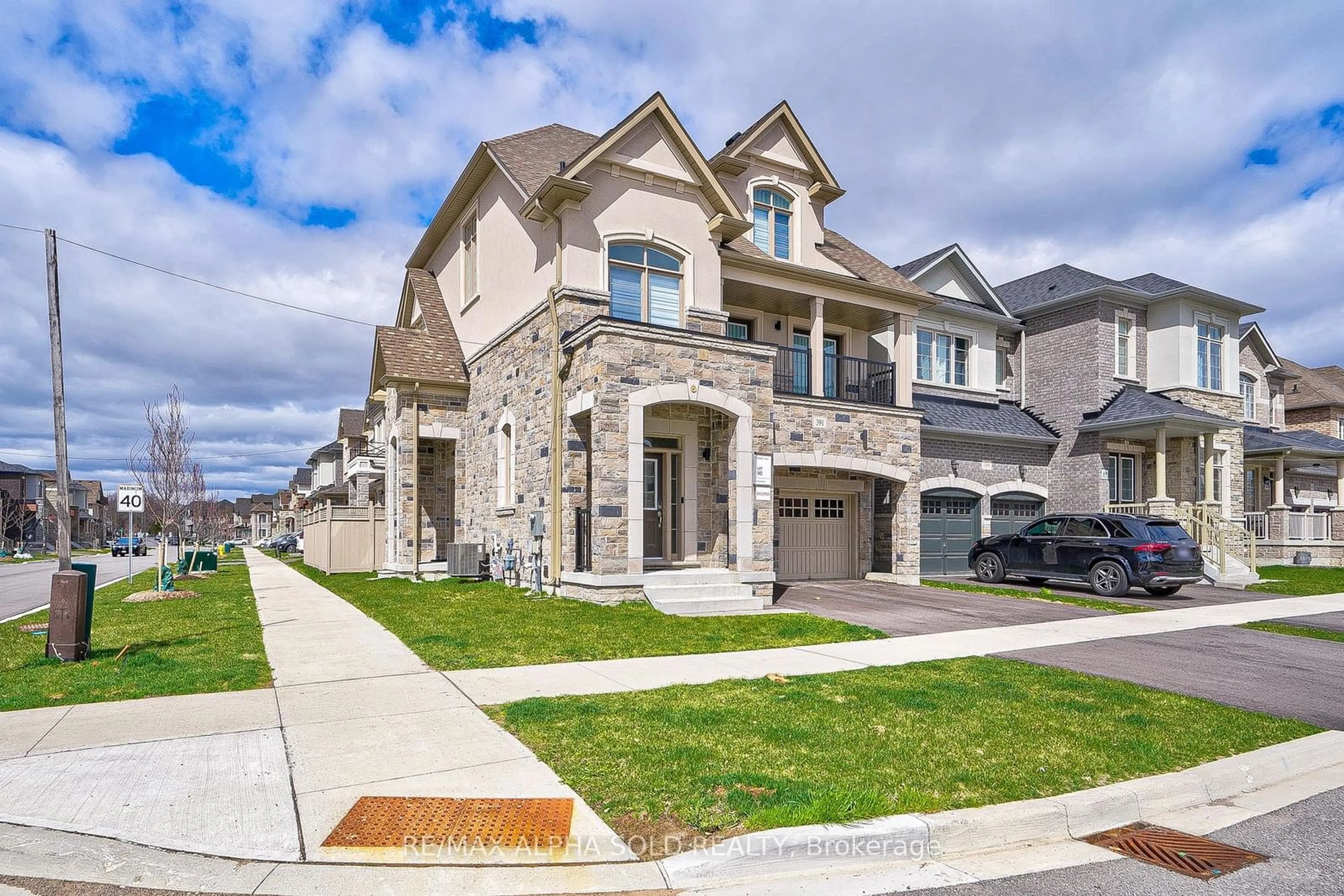 Home with brick exterior material, street for 391 Fred Mclaren Blvd, Markham Ontario L6E 0G4