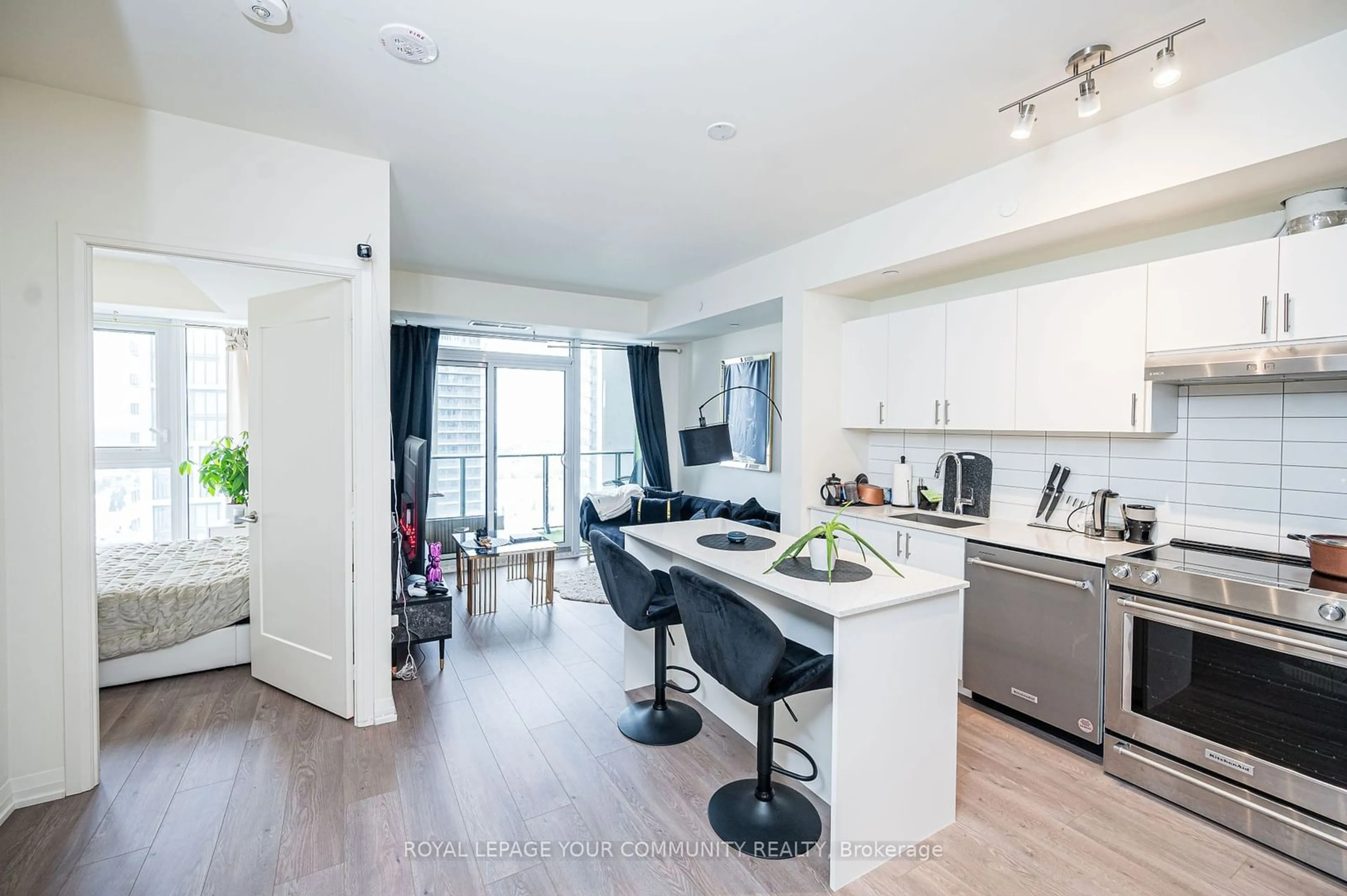 Open concept kitchen, wood/laminate floor for 9000 Jane St #2204, Vaughan Ontario L4K 0M6